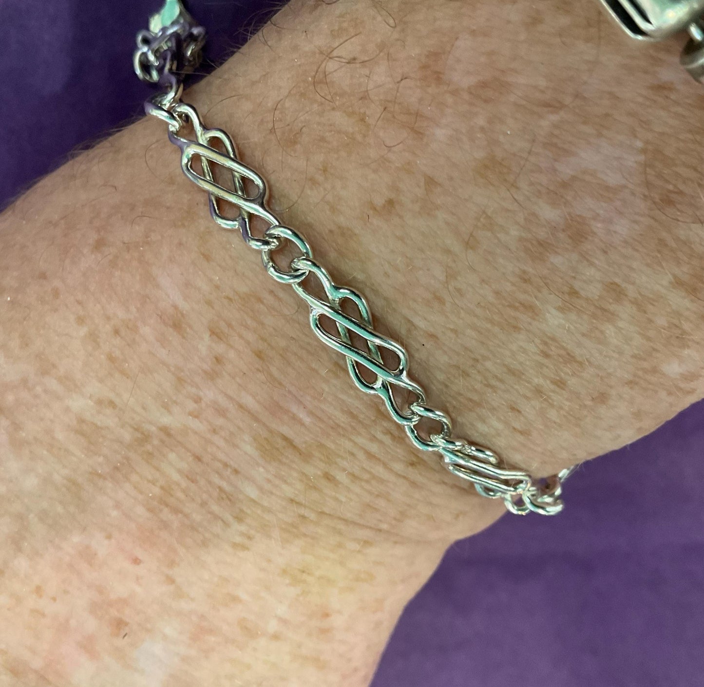 Vintage Italian silver infinity knot panel bracelet with 925 silver findings.