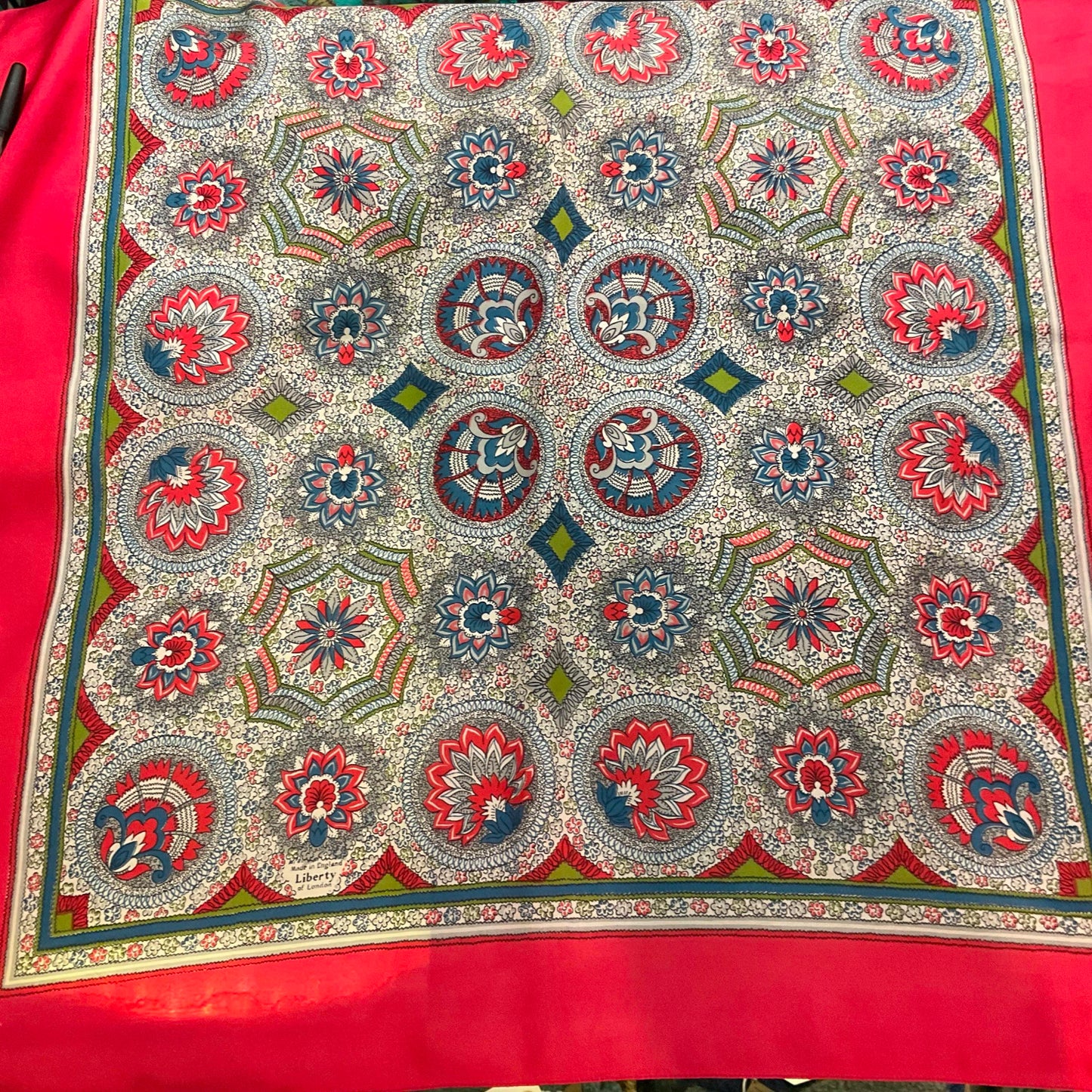 Vintage 1950s/60s pure silk geometric Paisley scarf, coral, blue, green and grey onto a pale cream background, made in England.