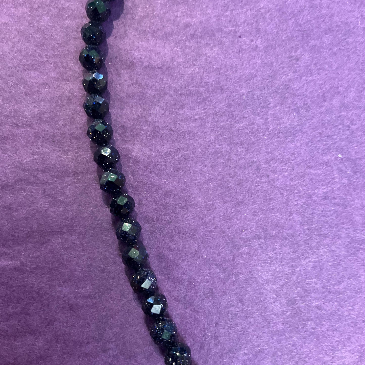 Vintage Style Starstone Gemstone and Gold Plate Belle Flower Beaded necklace by Rosie Fox , Navy glittering starstone with flower pendant