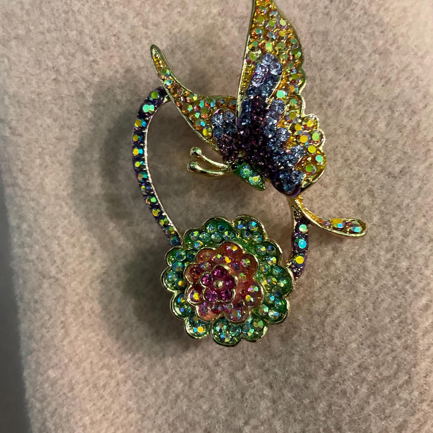 Vintage Butler and Wilson Crystal Rainbow Flower and Butterfly Brooch, gold tone with Borealis rhinestones, signed as new