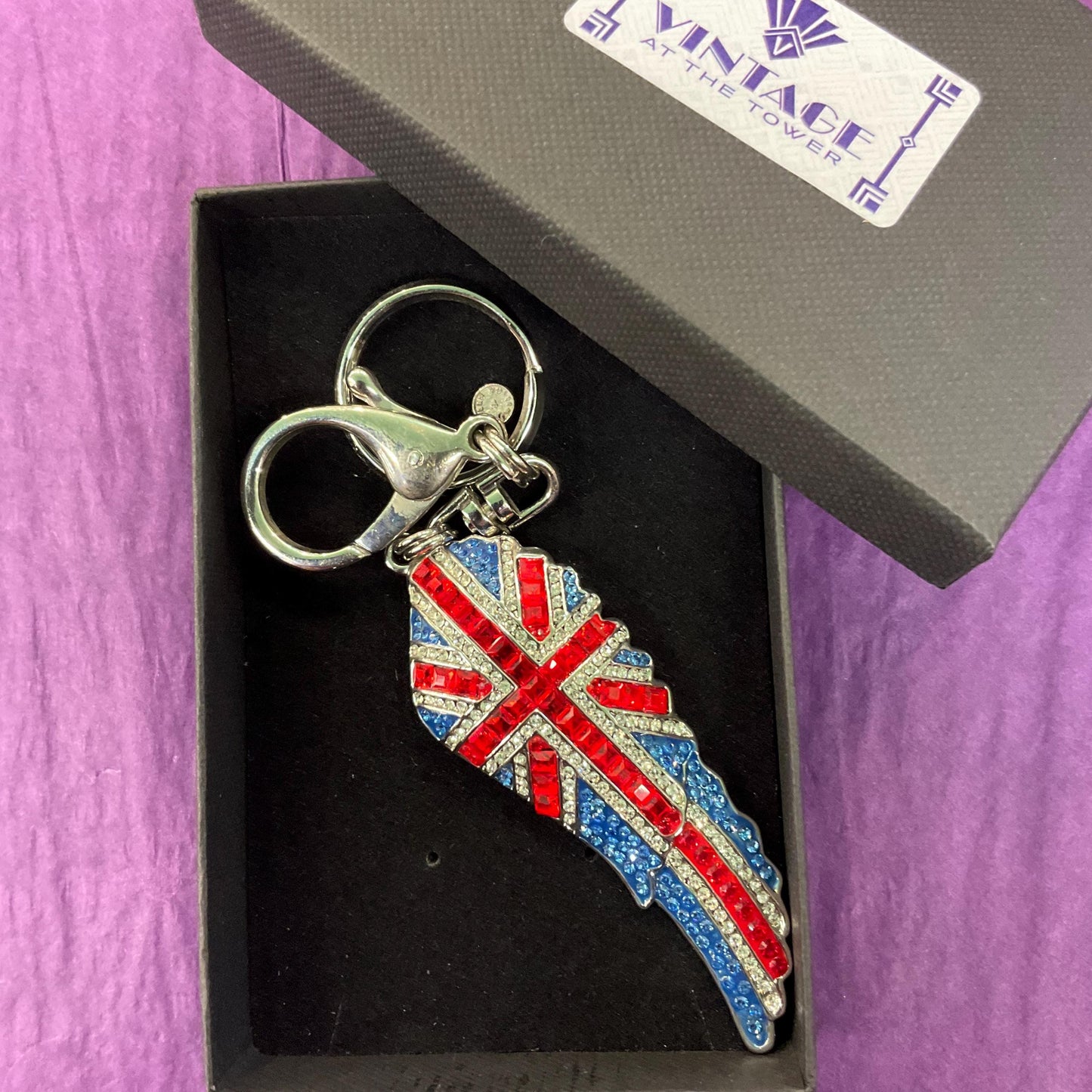 Vintage Butler and Wilson Crystal Union Jack Angel Wing Handbag Charm/ Keychain , silver tone with red , silver and blue rhinestones.
