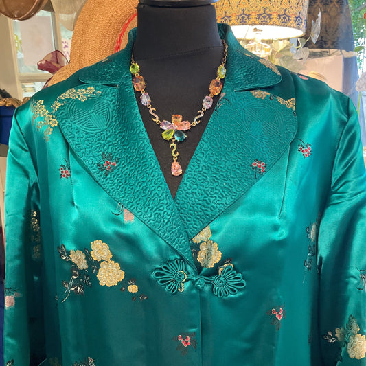 Vintage Chinese silk jacket with floral embroidery paired with a Butler and Wilson necklace