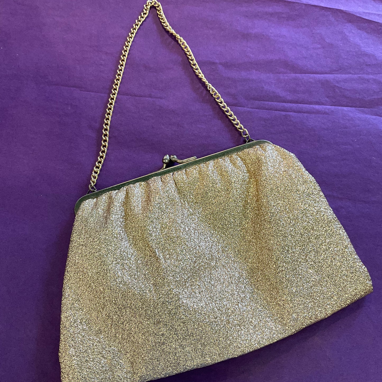 Vintage 1960s sparkling gold Lurex cocktail bag.