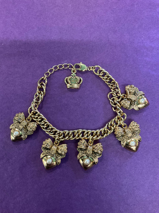 Vintage Butler and Wilson statement Gold tone and Faux Bow with Heart Charm Bracelet, signed