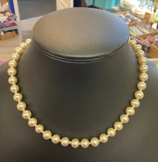 Vintage 1950s faux pearl necklace with silver clasp