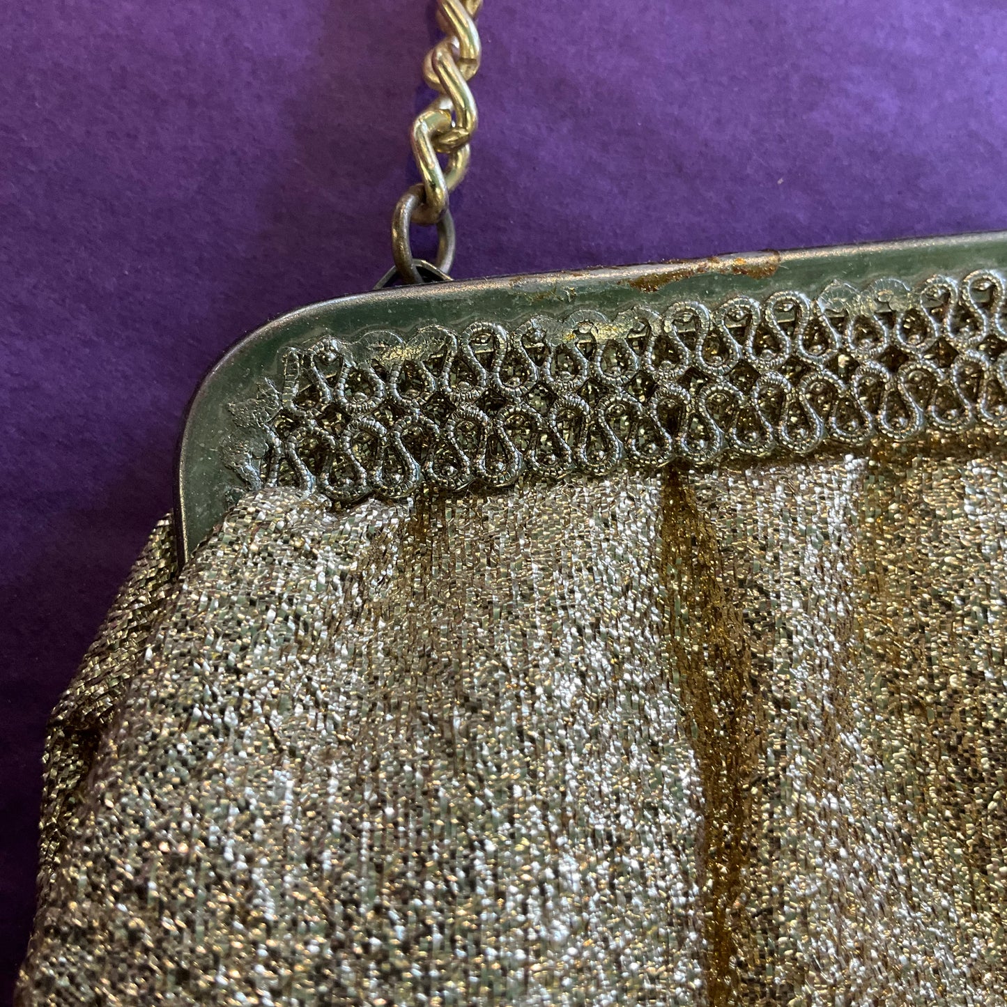 Vintage 1960s sparkling gold Lurex cocktail bag.