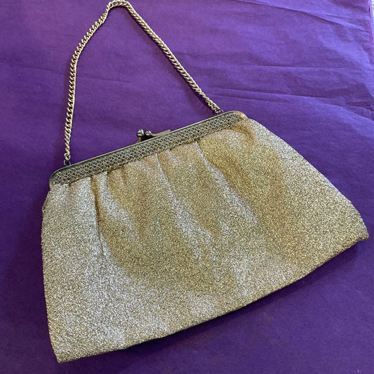 Vintage 1960s sparkling gold Lurex cocktail bag.