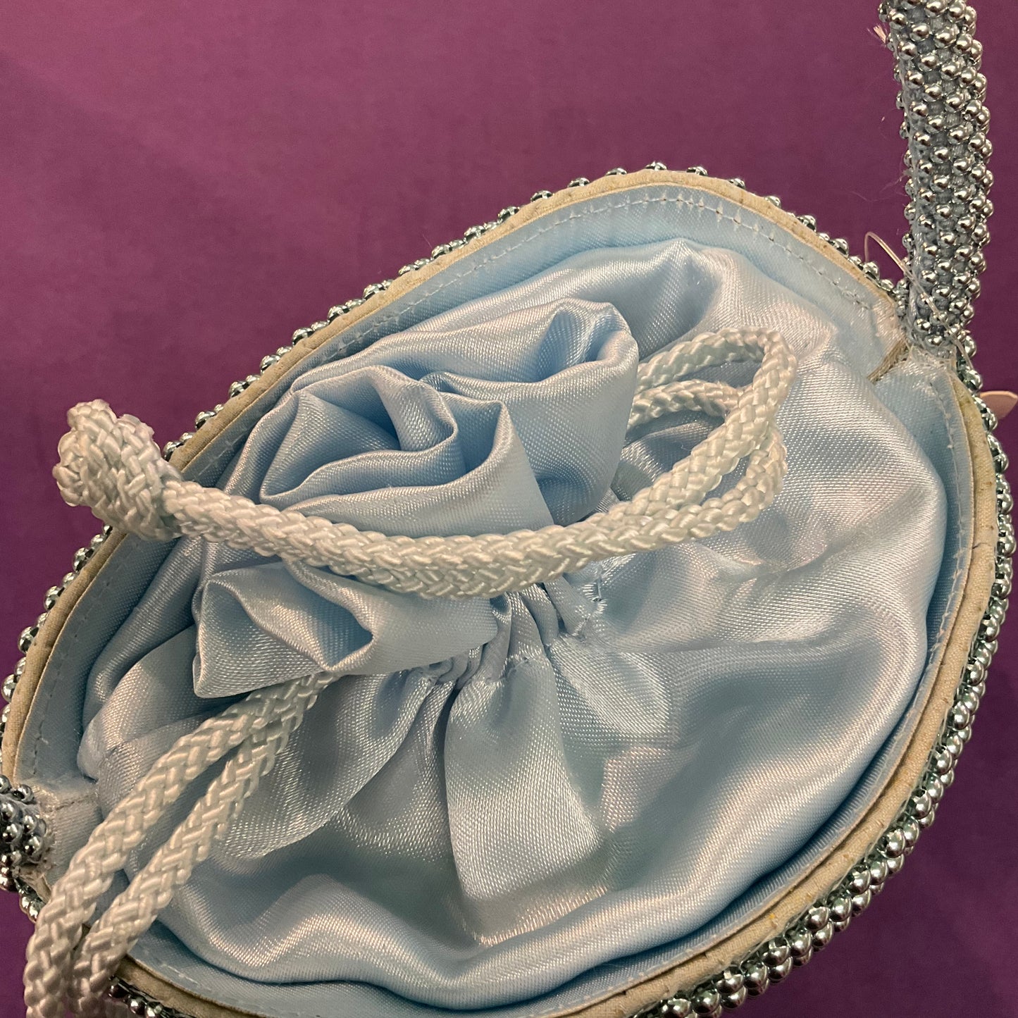 Vintage pale blue metallic beaded satin evening bag, Artistic pearl by IberBolos, bucket back style with drawstring fastening. Unused with tags.