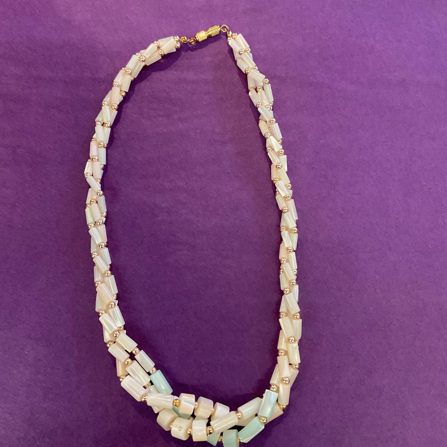 Vintage Mother of pearl twisted beaded necklace with pale aqua centre. prom, wedding.