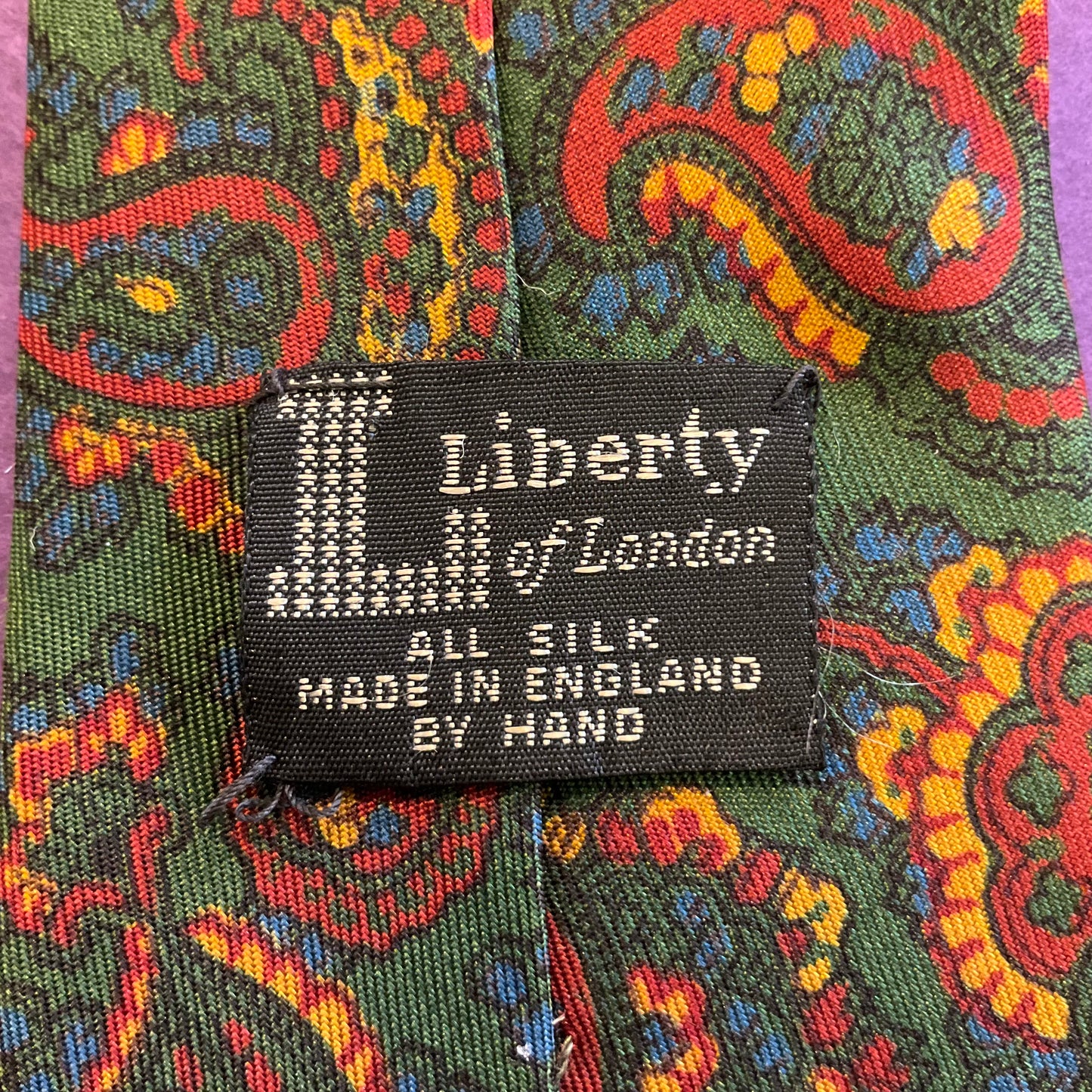 Vintage 1940/60s hand made in England Liberty of London pure silk Green and red paisley tie.