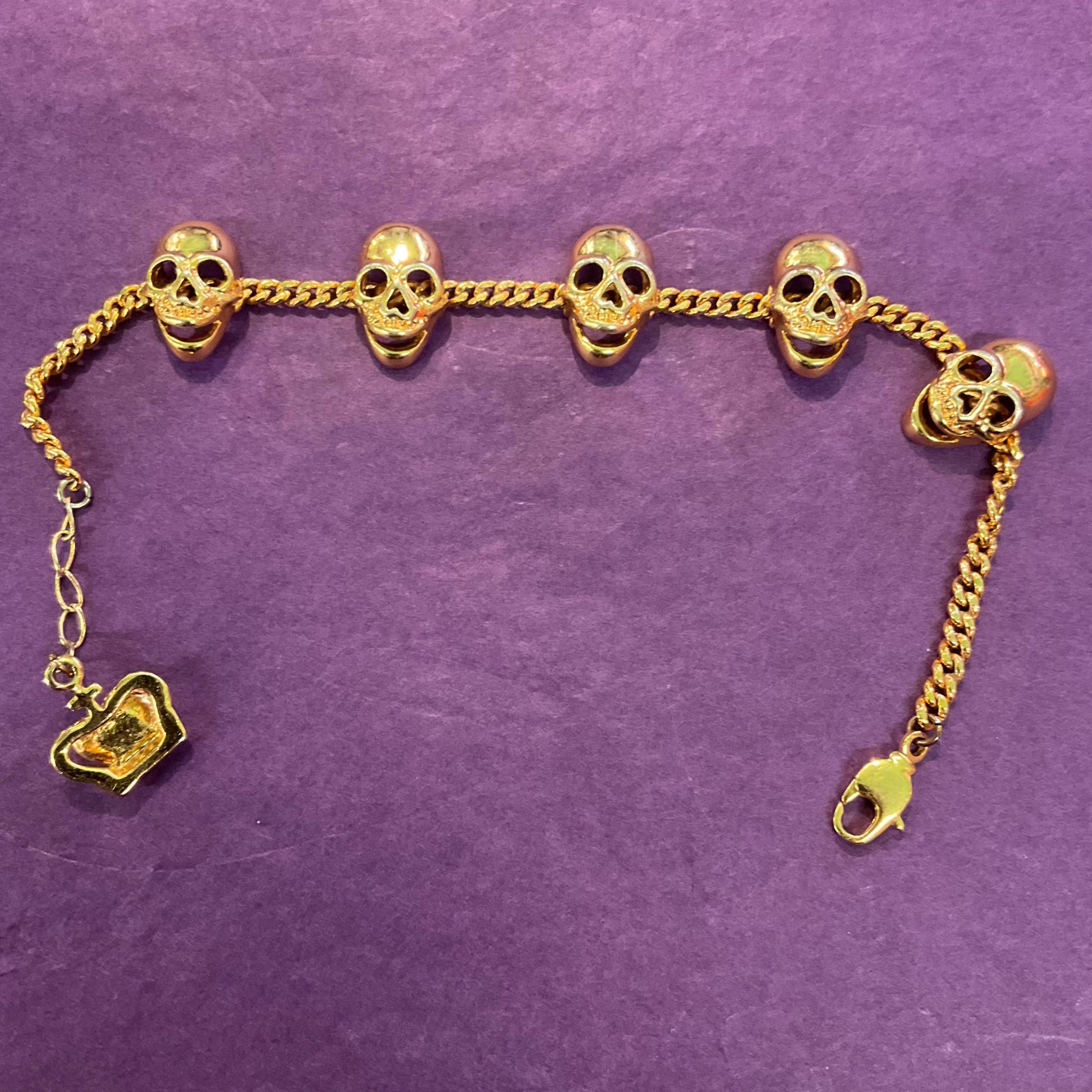 Vintage Butler and Wilson Gold Tone Skull Charm Bracelet, rare gold colour, Signed as new, steampunk fan gift