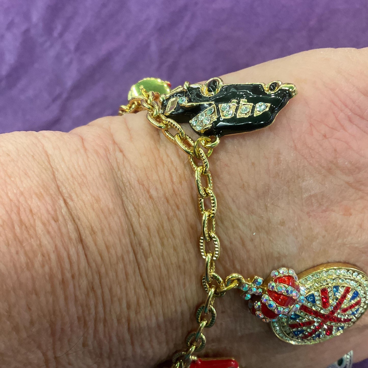 Vintage Butler and Wilson Crystal London Icons Charm Bracelet, Gold tone with enamel and multicoloured rhinestones, signed