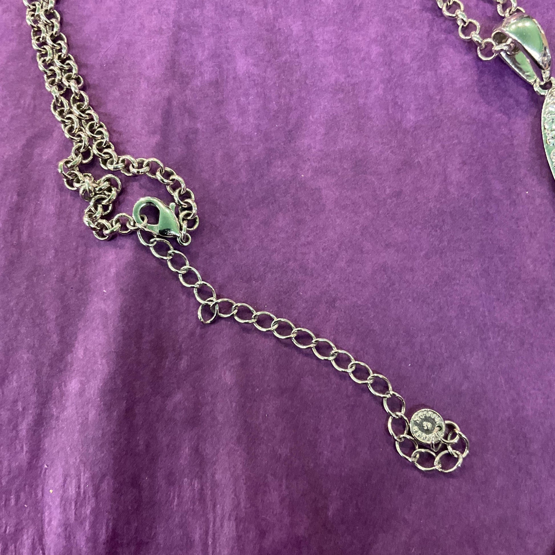 Vintage Butler and Wilson Silver Crystal Articulated Long Pendant, silver tone with Aurora Borealis Crystals.