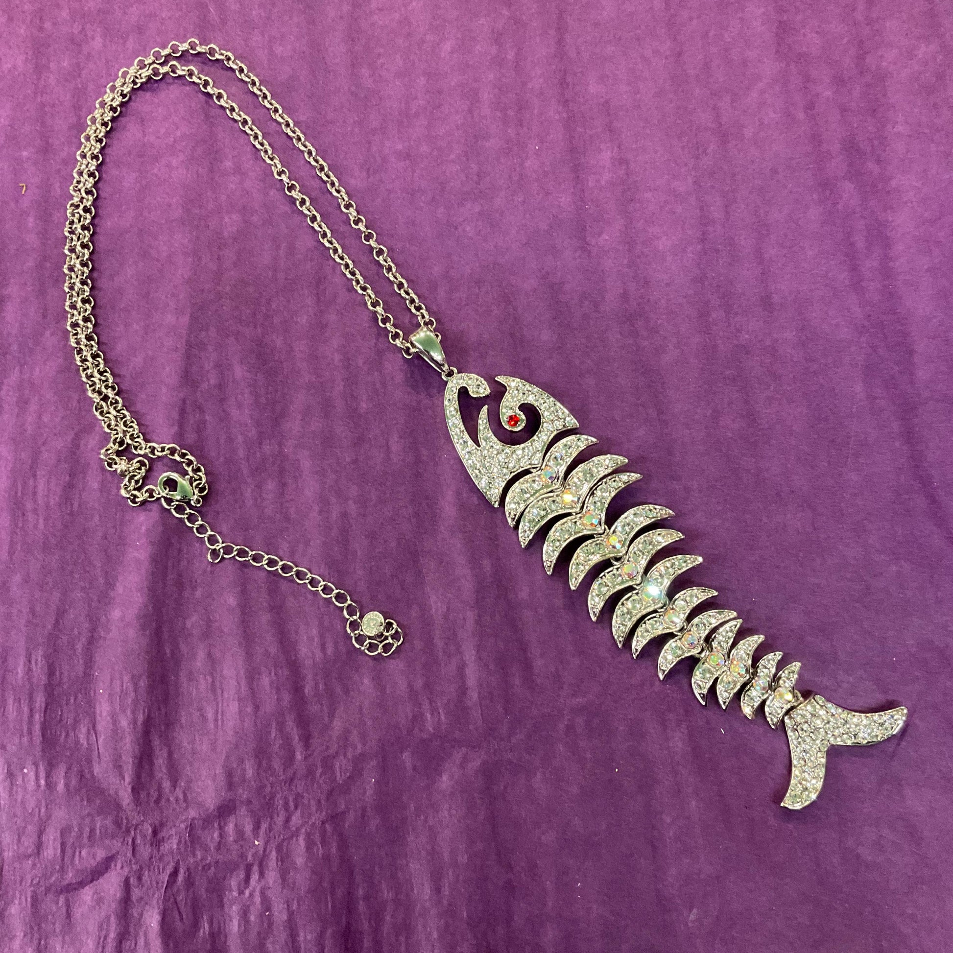 Vintage Butler and Wilson Silver Crystal Articulated Long Pendant, silver tone with Aurora Borealis Crystals.