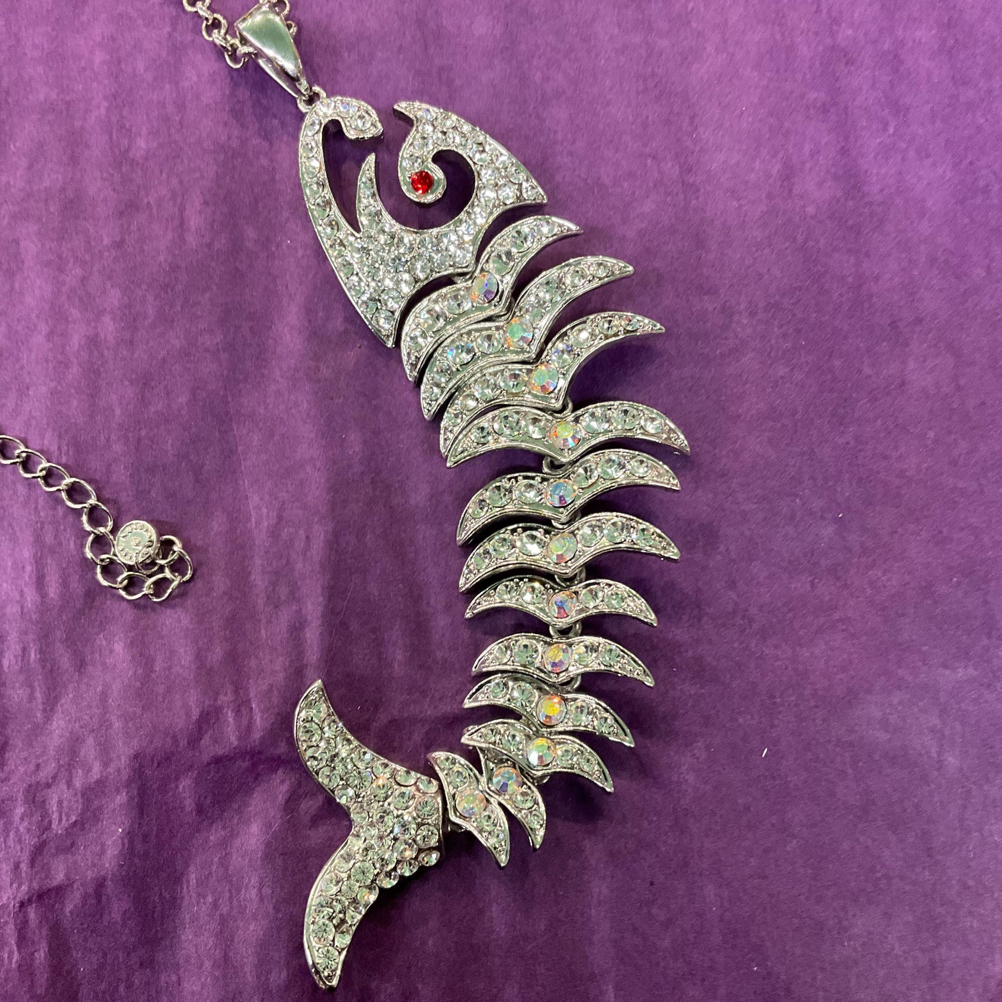 Vintage Butler and Wilson Silver Crystal Articulated Long Pendant, silver tone with Aurora Borealis Crystals.