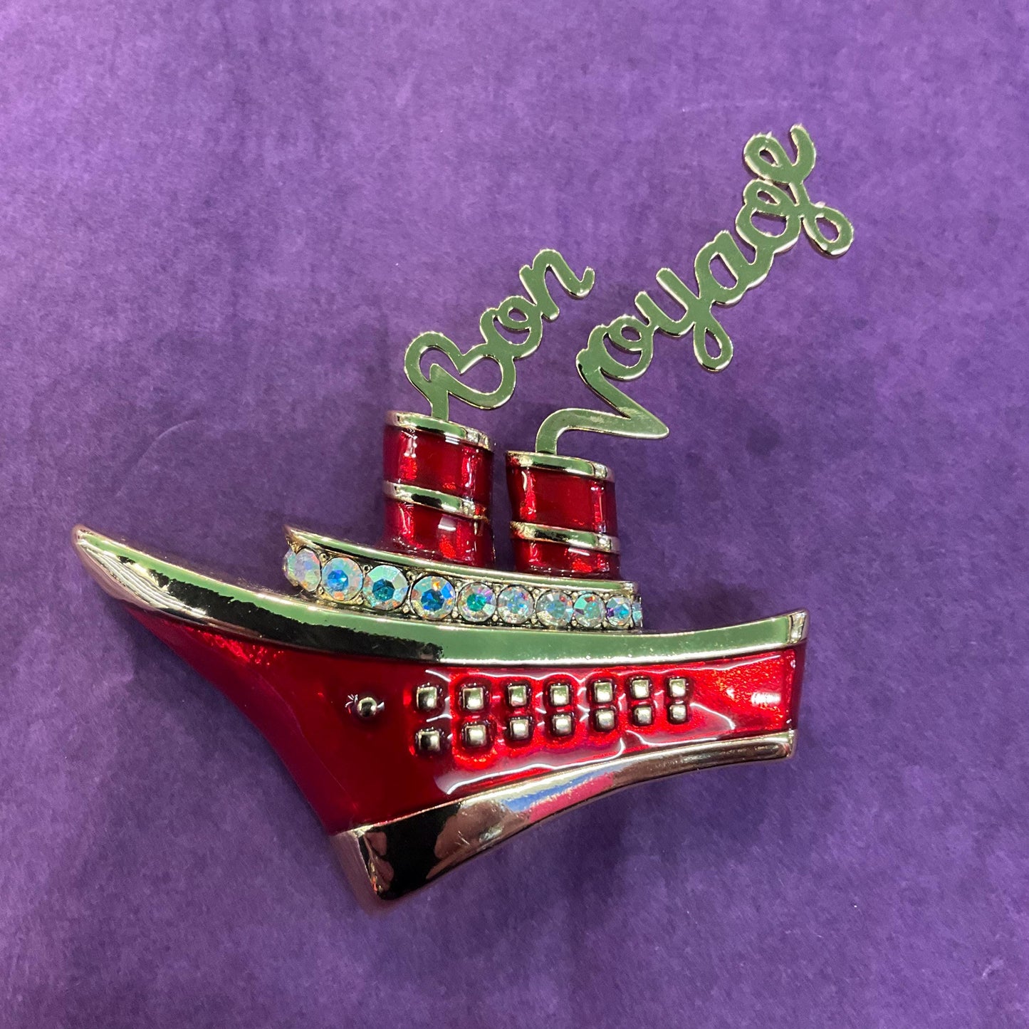 Vintage Butler and Wilson Art Deco Style ‘Bon Voyage’ large brooch, Gold tone metal with lustre enamel and Borealis crystals