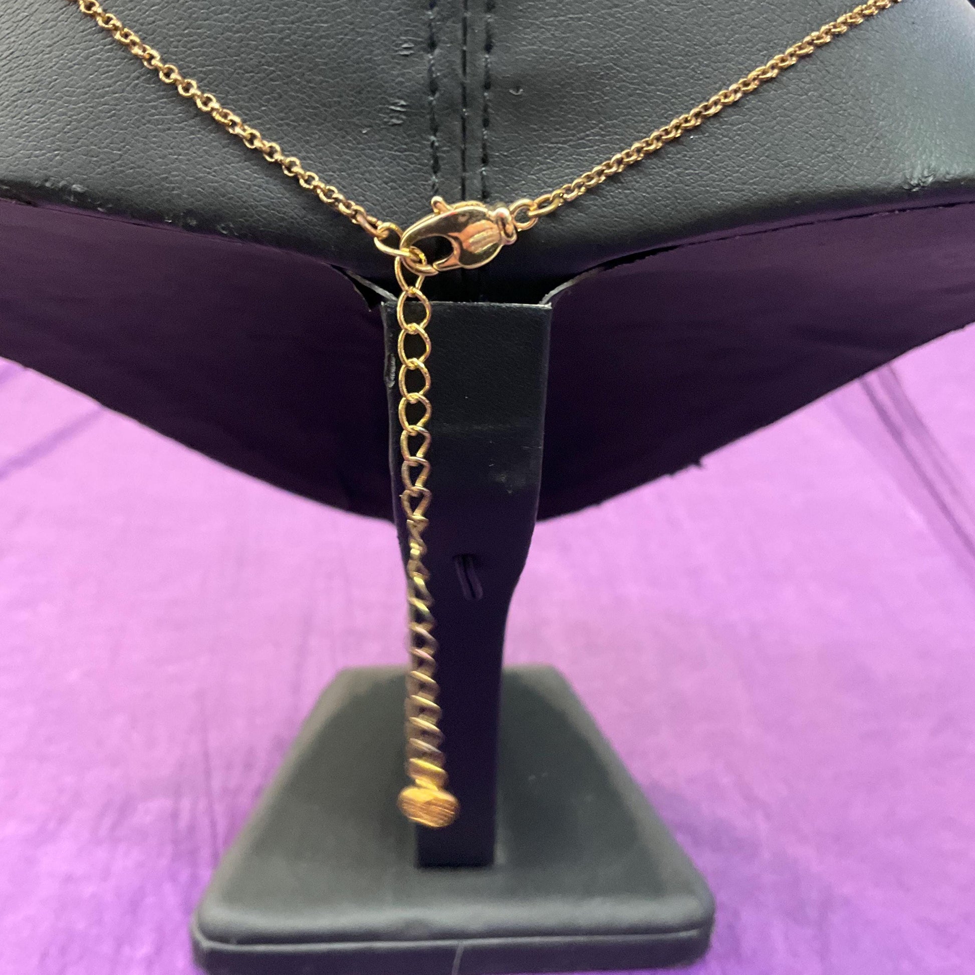 Vintage Butler and Wilson Rainbow Crystal Celtic Infinity Knot Pendant, Gold tone with Borealis multicoloured rhinestones