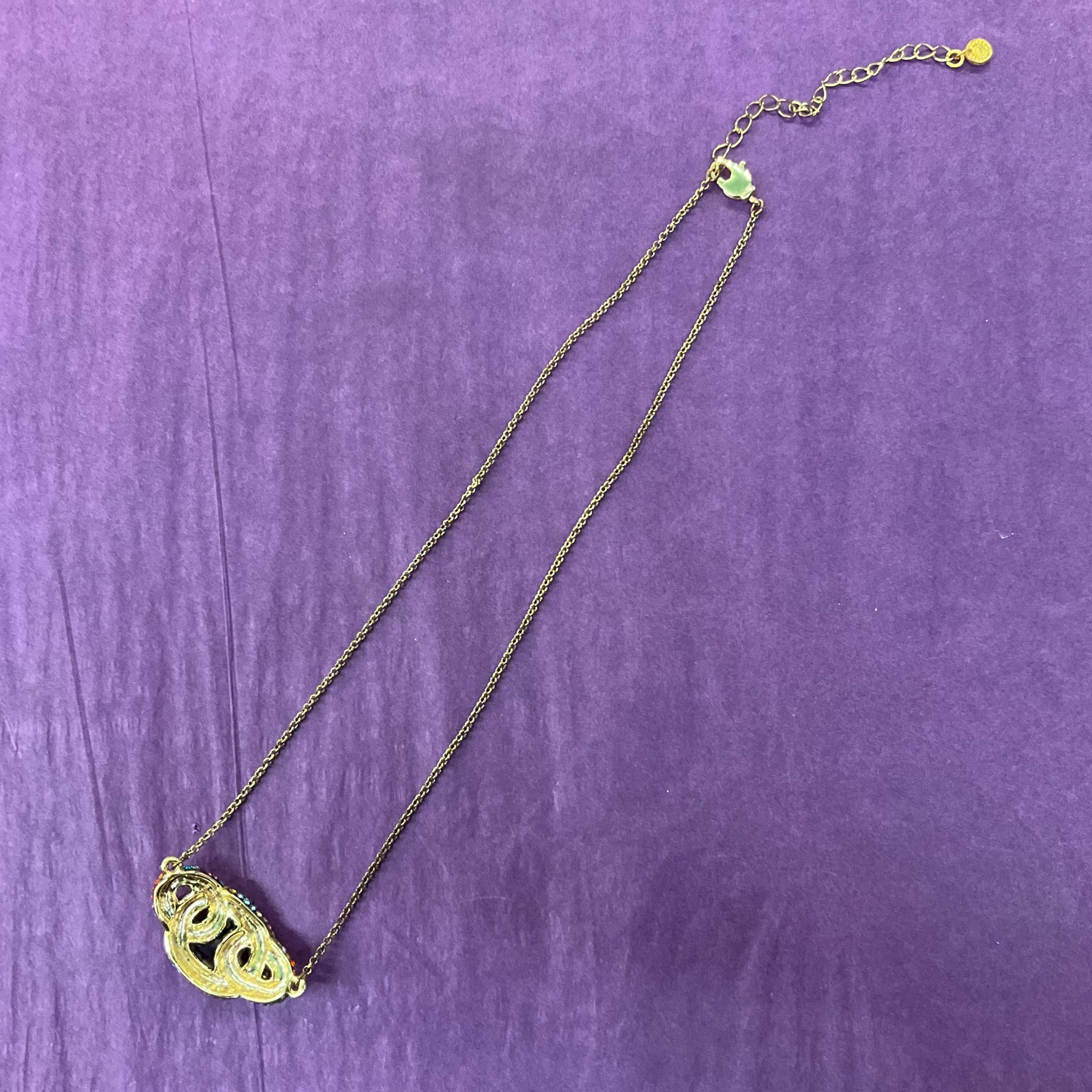 Vintage Butler and Wilson Rainbow Crystal Celtic Infinity Knot Pendant, Gold tone with Borealis multicoloured rhinestones