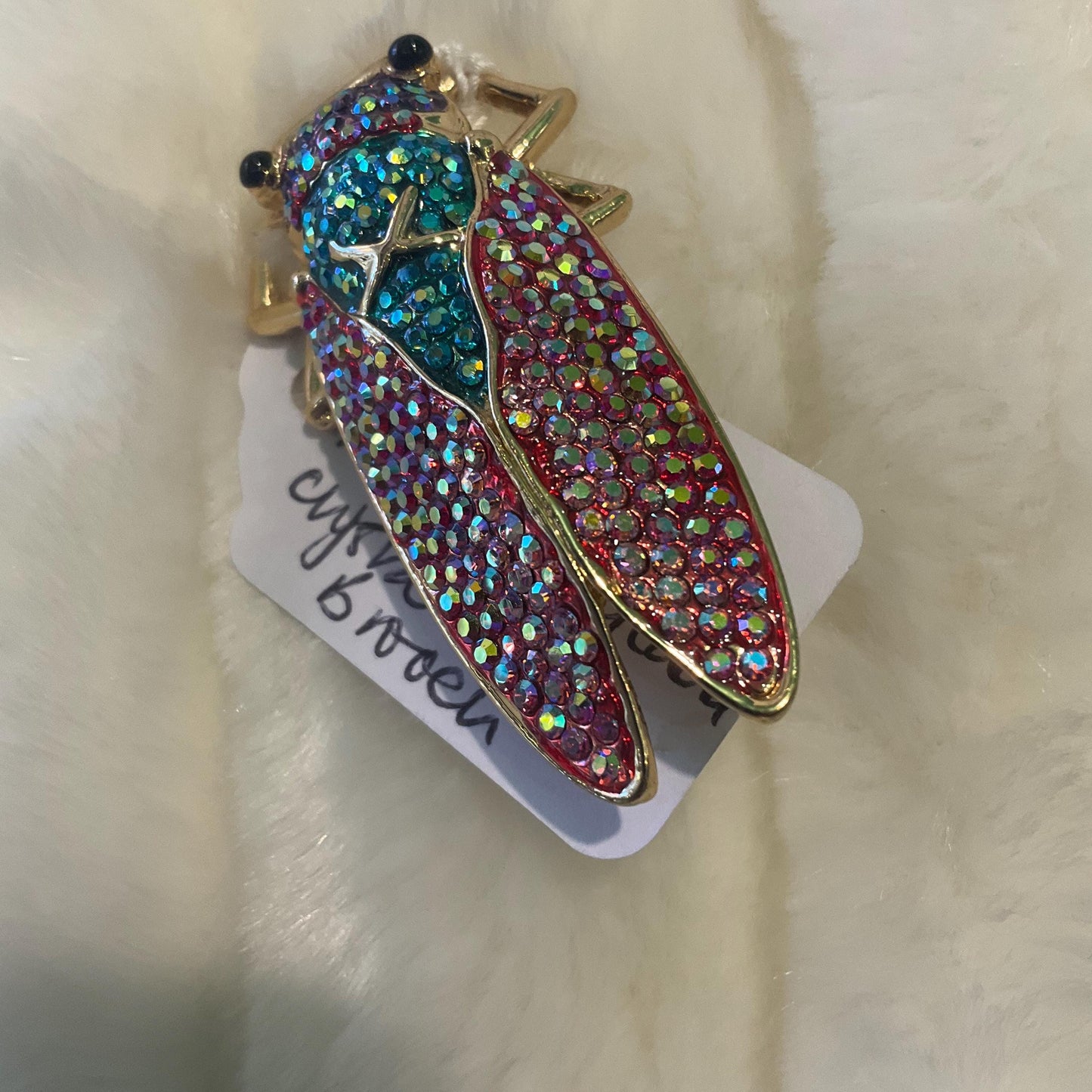 Vintage Butler and Wilson Rainbow Crystal Cicada Brooch, gold tone with multicoloured Borealis rhinestones