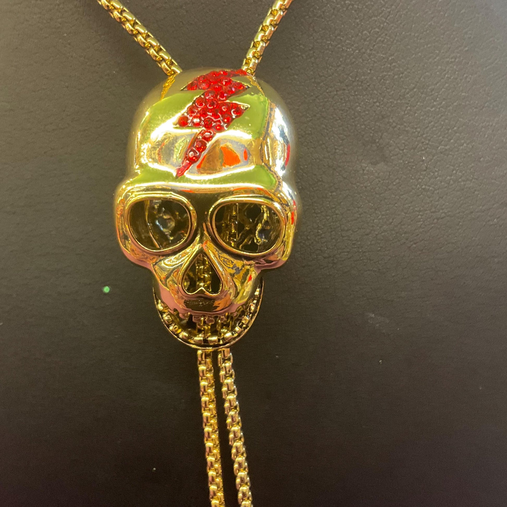 Vintage Butler and Wilson Gold Skull Crystal Lariat Necklace, Gold tone with red Bowie Rhinestone Lightening Flash