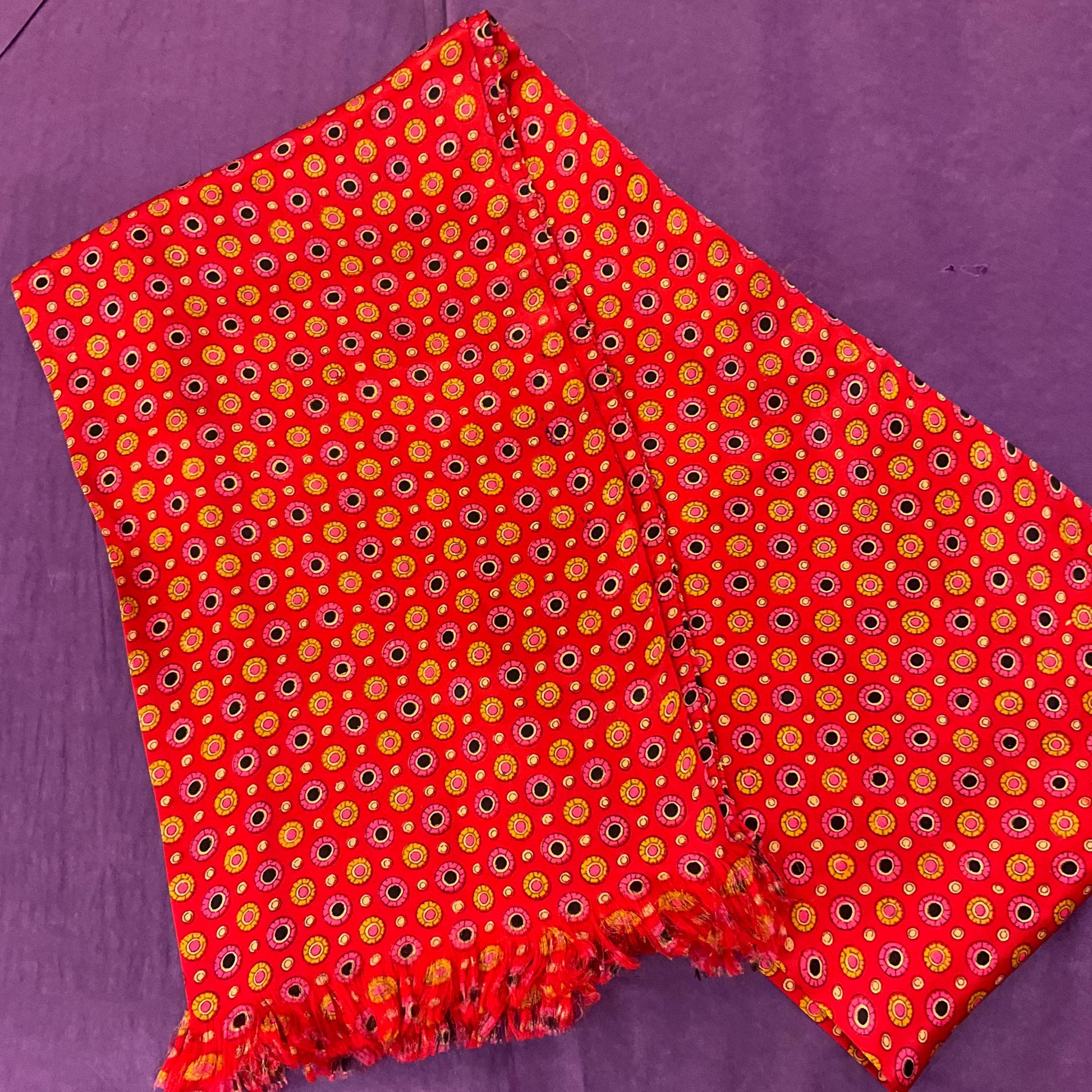 Vintage pure Silk Gents Dress Finged Scarf, vibrant circular print in shades of red, gold, pink and black