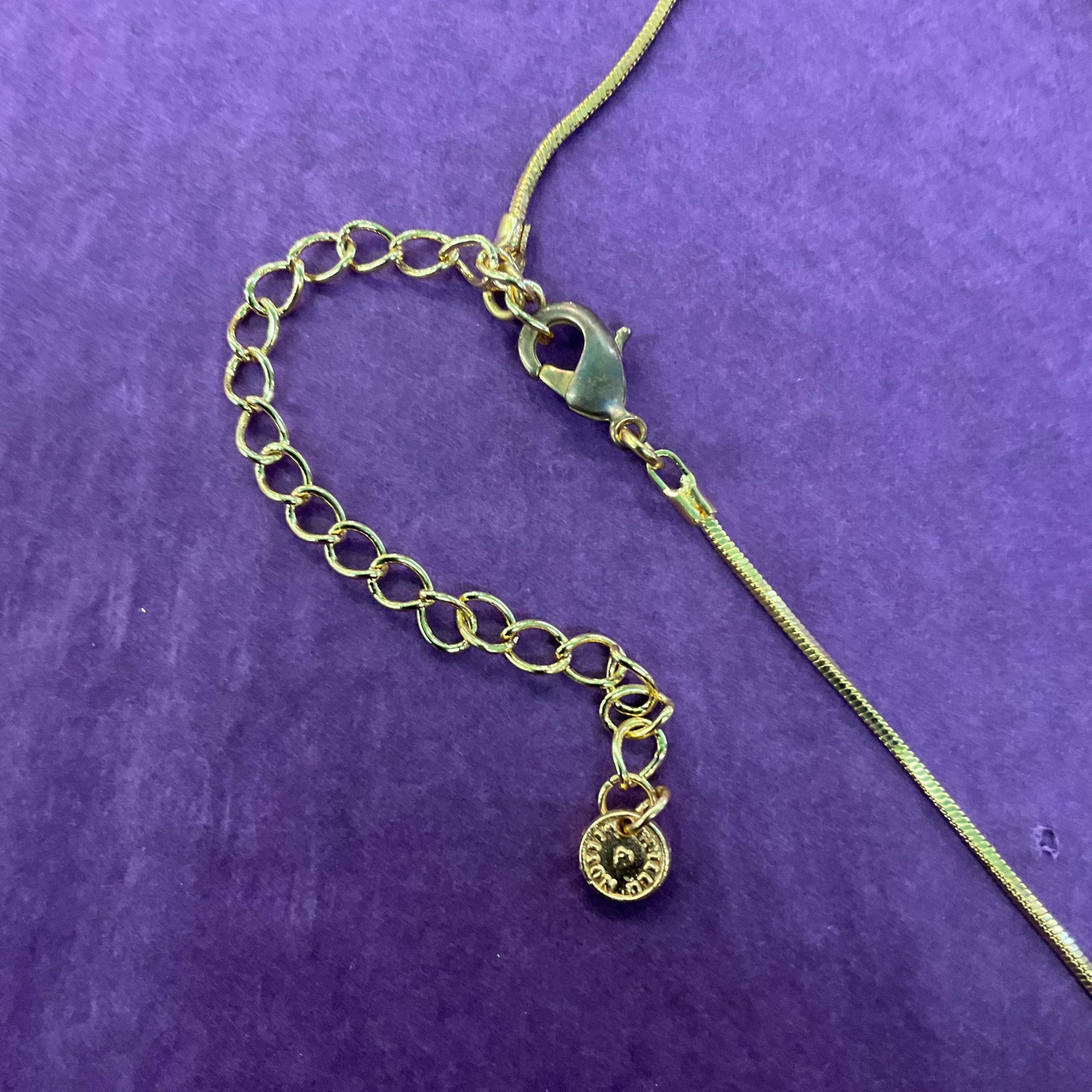 Vintage Butler and Wilson Red Crystal Asymetrical Heart Pendant, gold tone with red rhinestones and Aurora Borealis Crystal