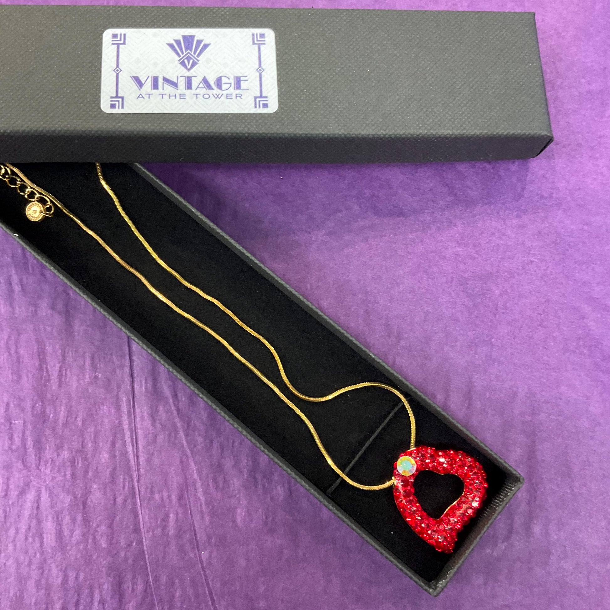 Vintage Butler and Wilson Red Crystal Asymetrical Heart Pendant, gold tone with red rhinestones and Aurora Borealis Crystal