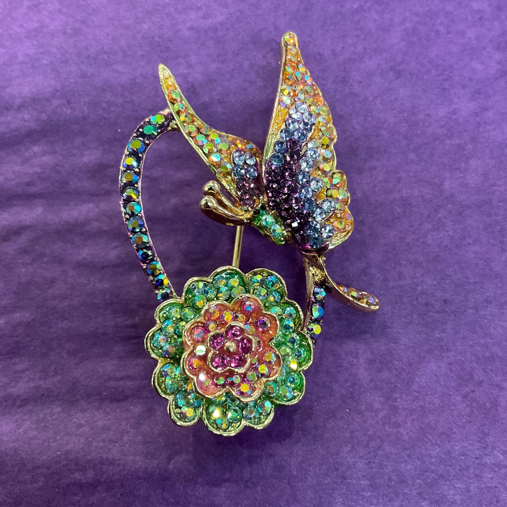 Vintage Butler and Wilson Crystal Rainbow Flower and Butterfly Brooch, gold tone with Borealis rhinestones, signed as new