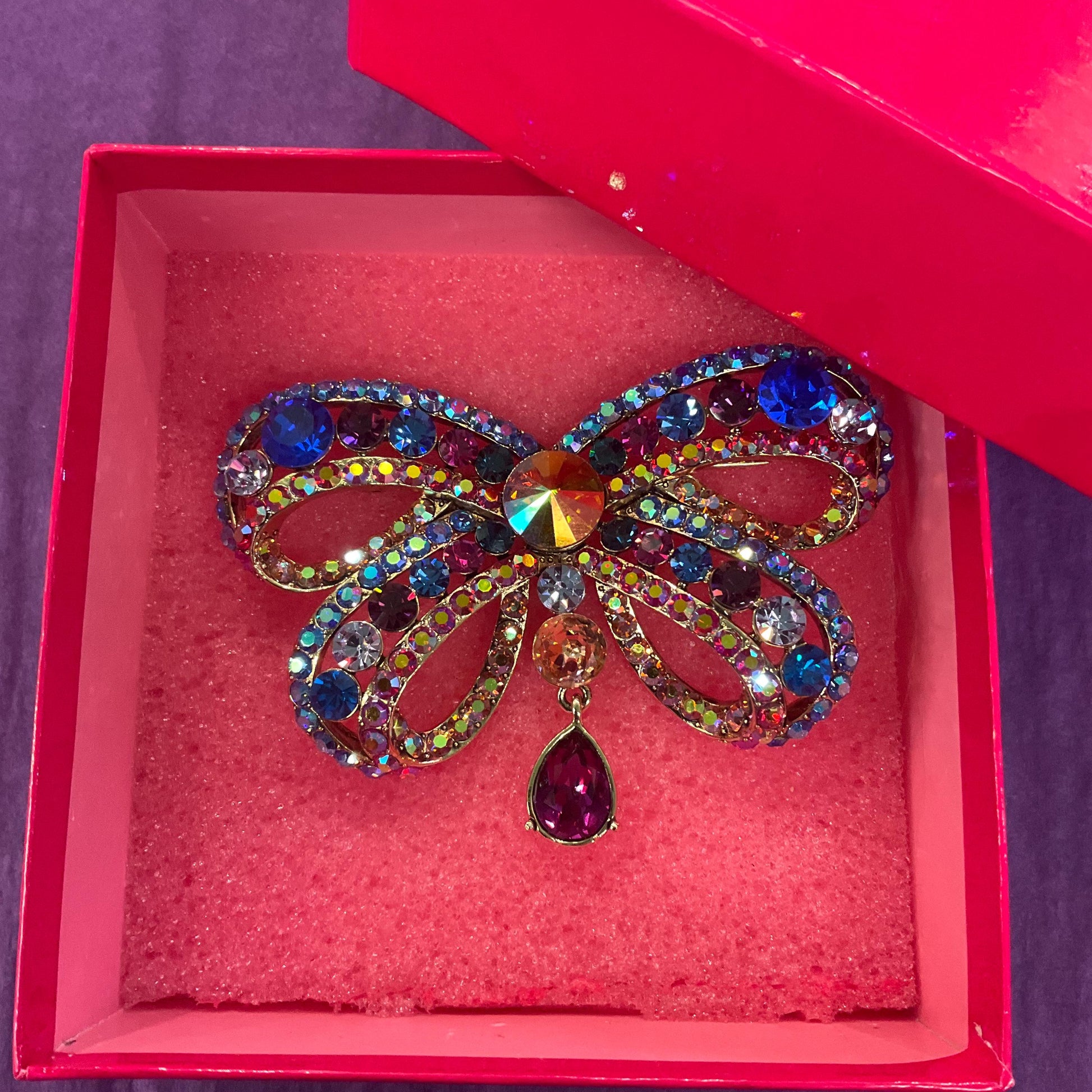 Vintage Butler and Wilson Statement Rainbow Crystal Bow Brooch, Gold tone with multicoloured crystals and Borealis rhinestones