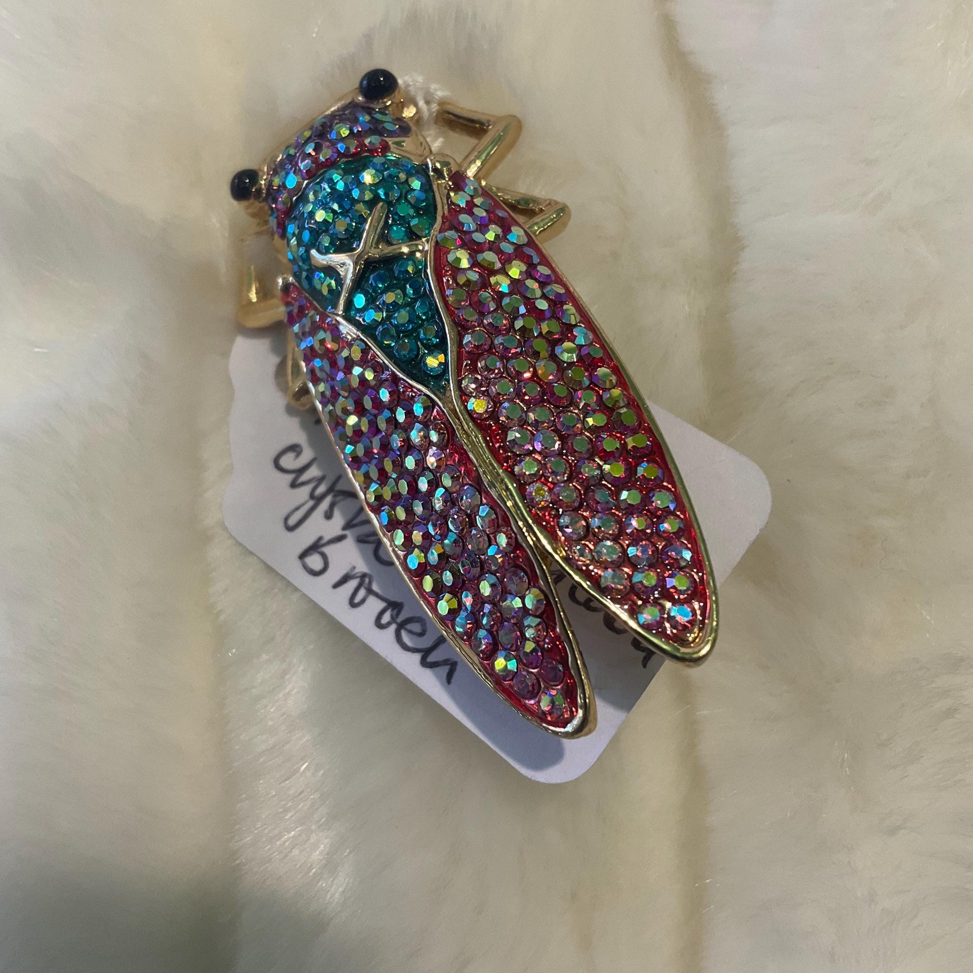 Vintage Butler and Wilson Rainbow Crystal Cicada Brooch, gold tone with multicoloured Borealis rhinestones