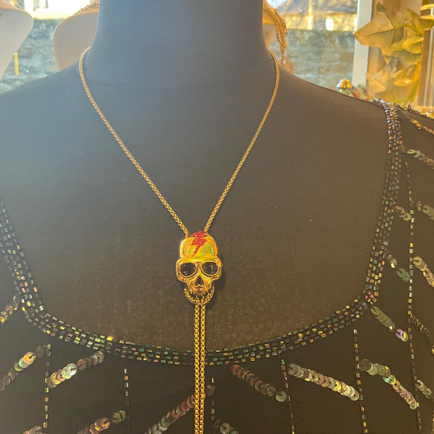 Vintage Butler and Wilson Gold Skull Crystal Lariat Necklace, Gold tone with red Bowie Rhinestone Lightening Flash