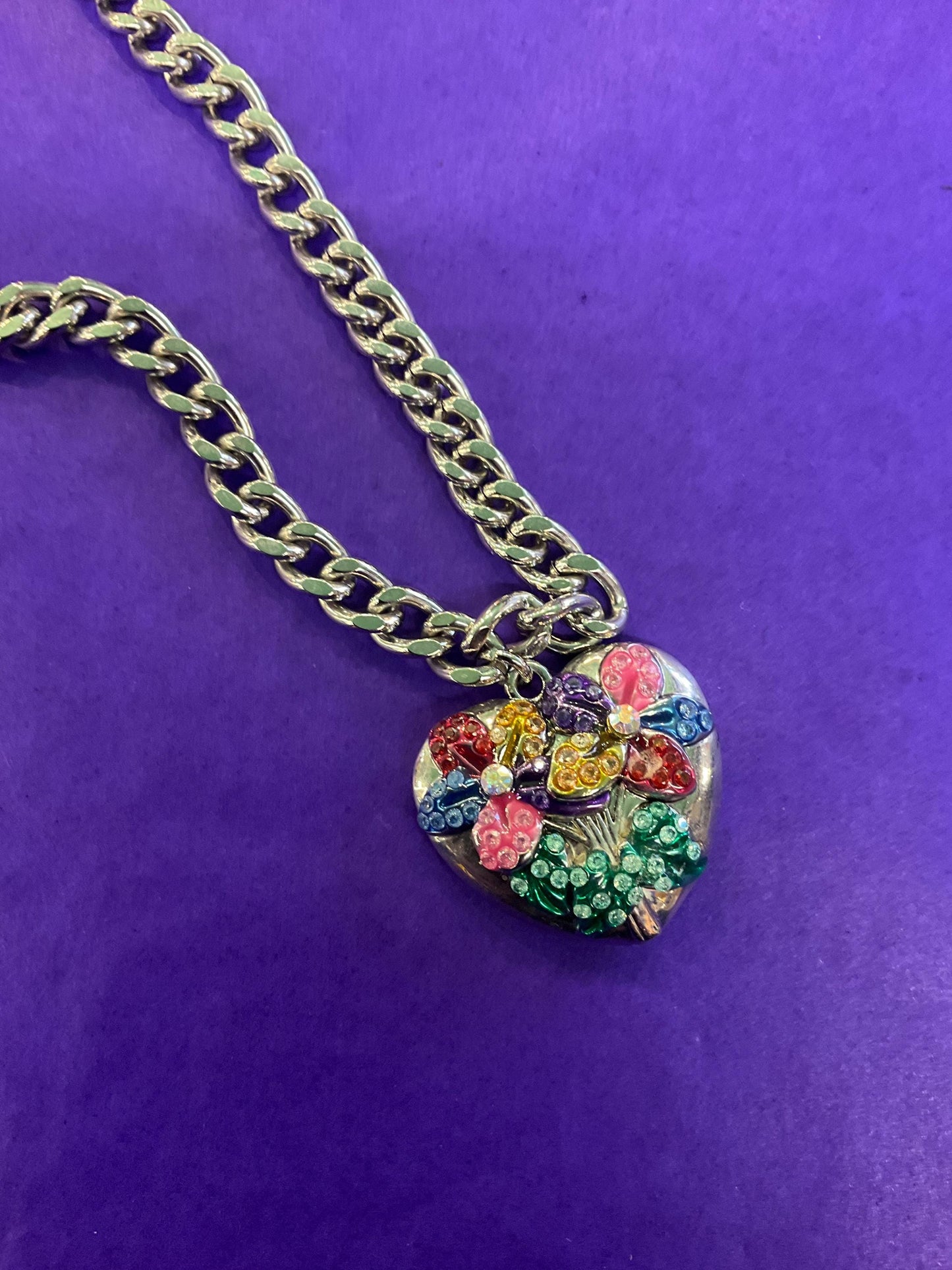 vintage Butler and Wilson floral heart pendant, silver tone metal with multicoloured enamel and borealis rhinestones.