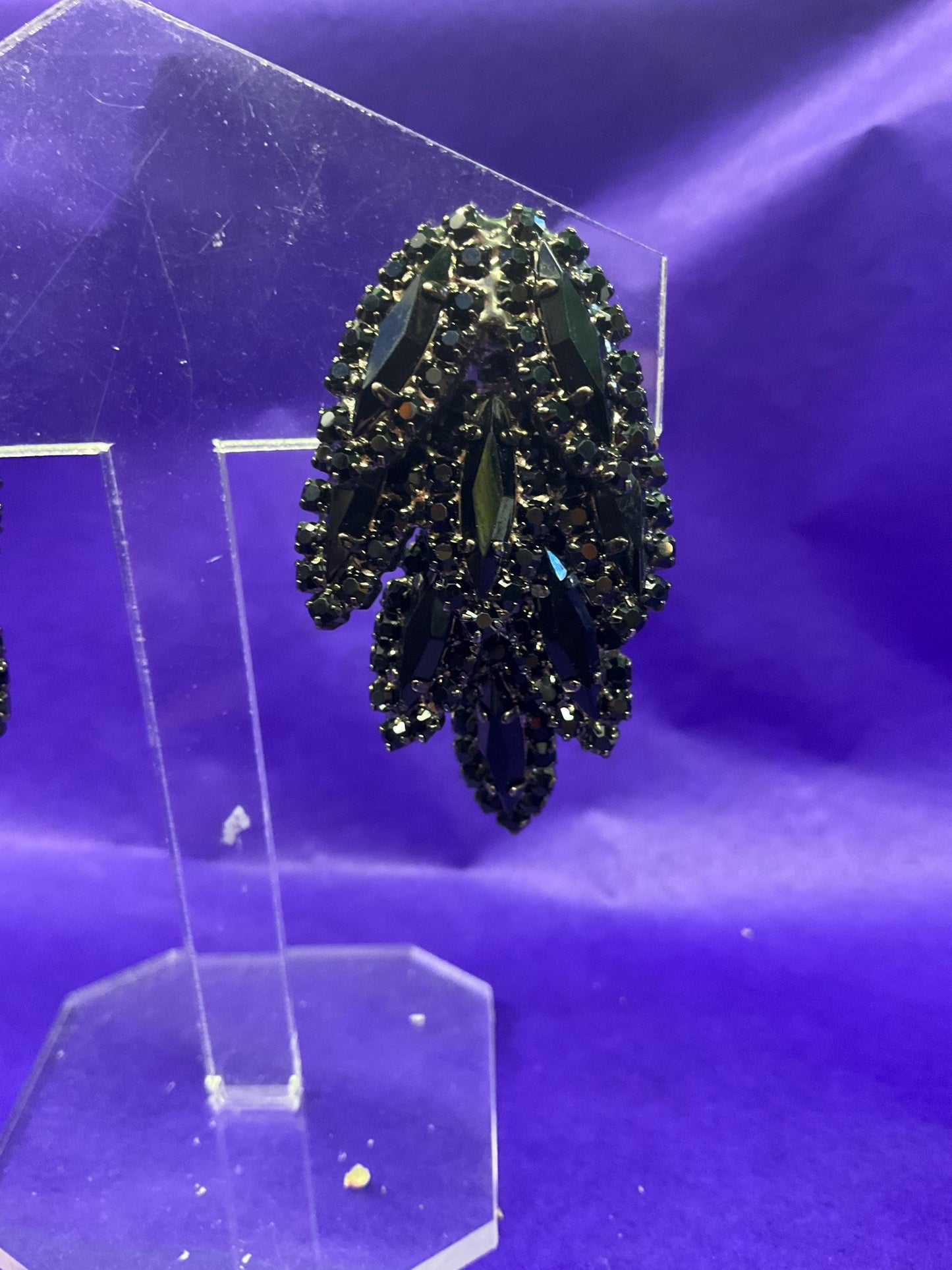 vintage Butler and Wilson large black crystal clip on earrings, hanging articulated leaves of crystal and rhinestones.