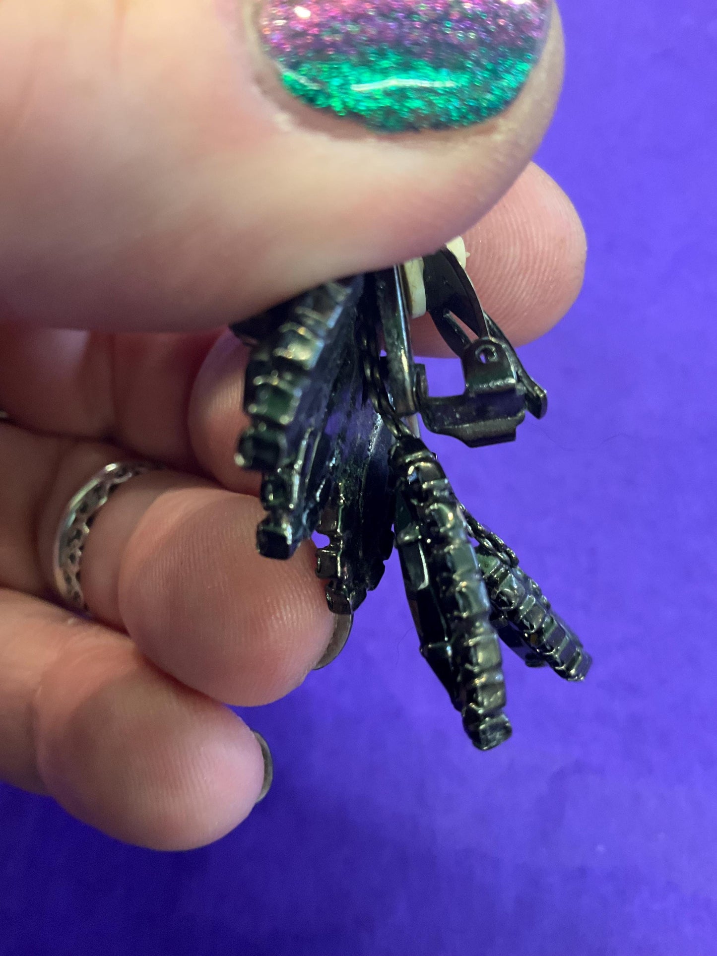 vintage Butler and Wilson large black crystal clip on earrings, hanging articulated leaves of crystal and rhinestones.