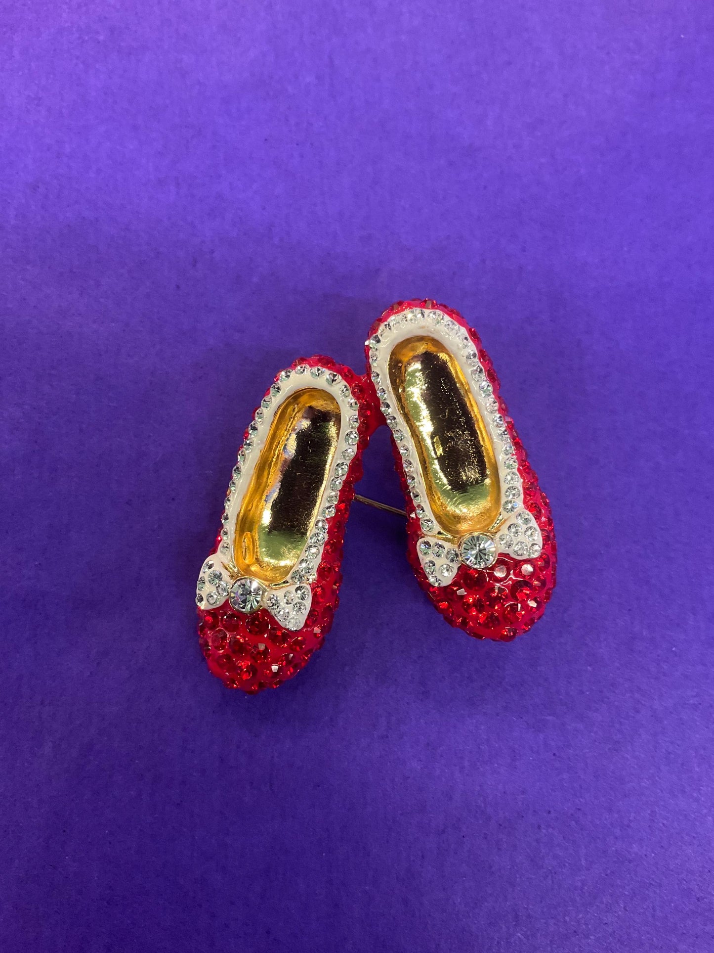 Vintage Butler and Wilson Crystal Dorothy Shoes large brooch in gold tone metal, red and silver rhinestones