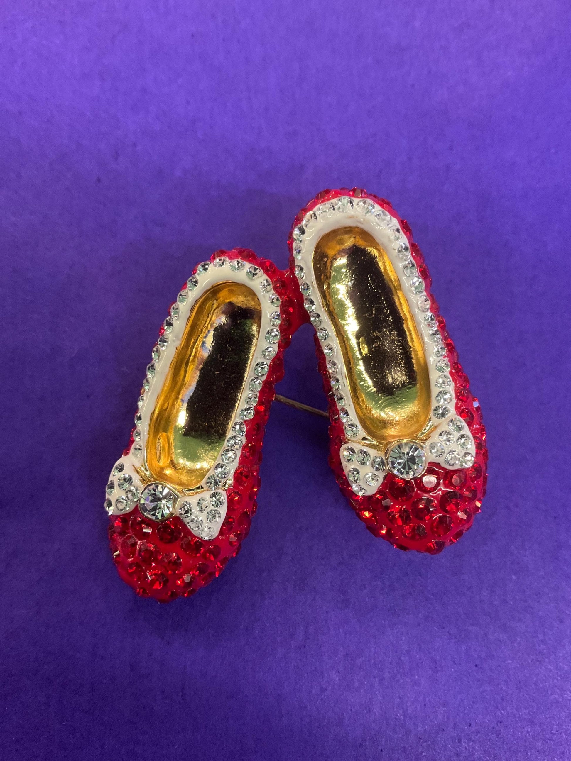 Vintage Butler and Wilson Crystal Dorothy Shoes large brooch in gold tone metal, red and silver rhinestones