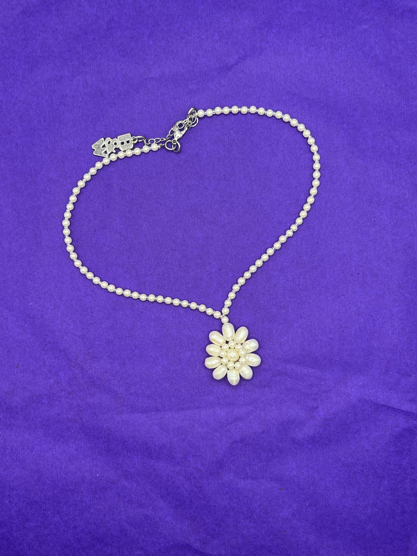 Vintage Butler and Wilson Oyster Coloured Fresh Water Pearl Floral Necklace, signed as new