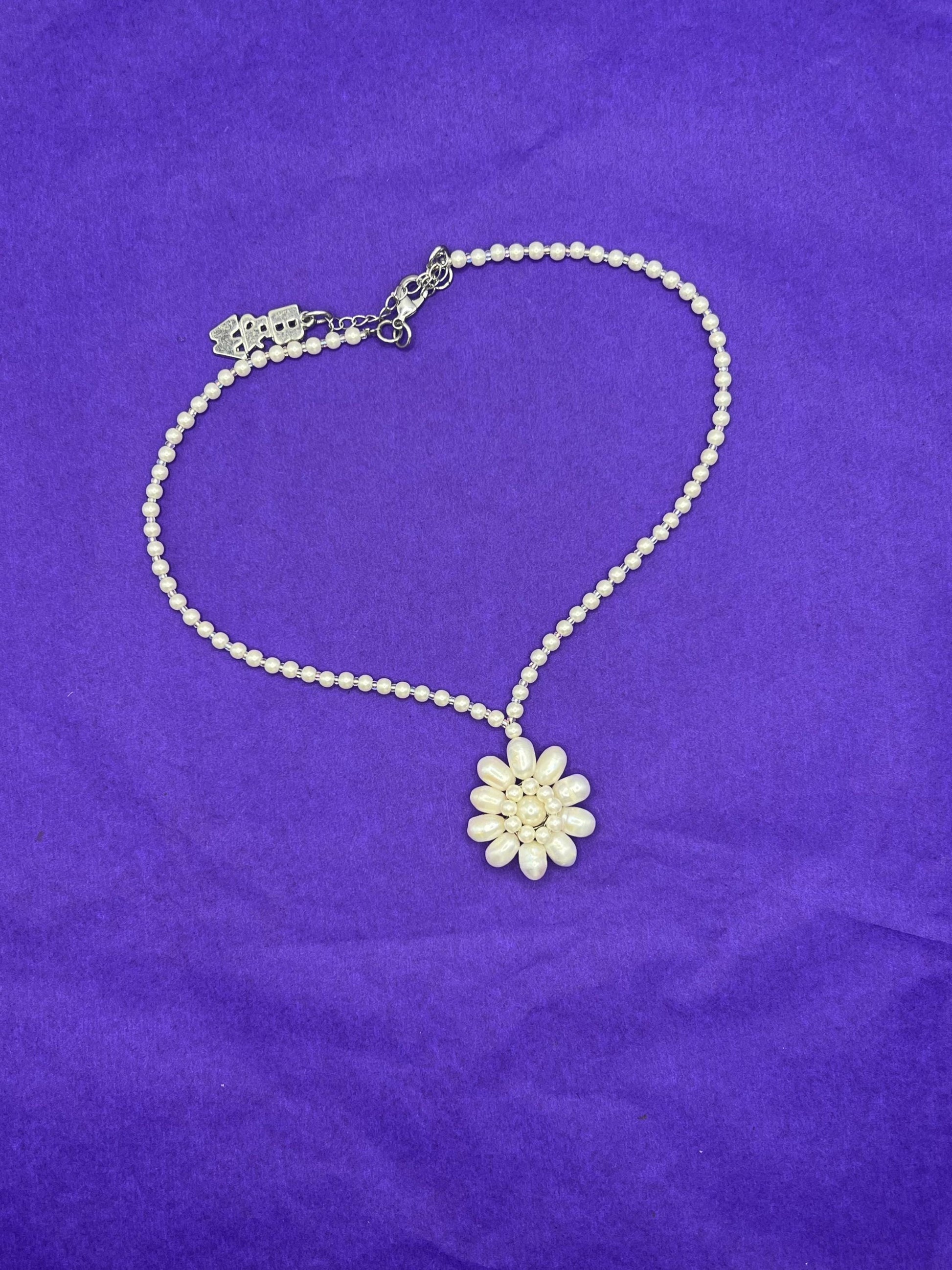 Vintage Butler and Wilson Oyster Coloured Fresh Water Pearl Floral Necklace, signed as new