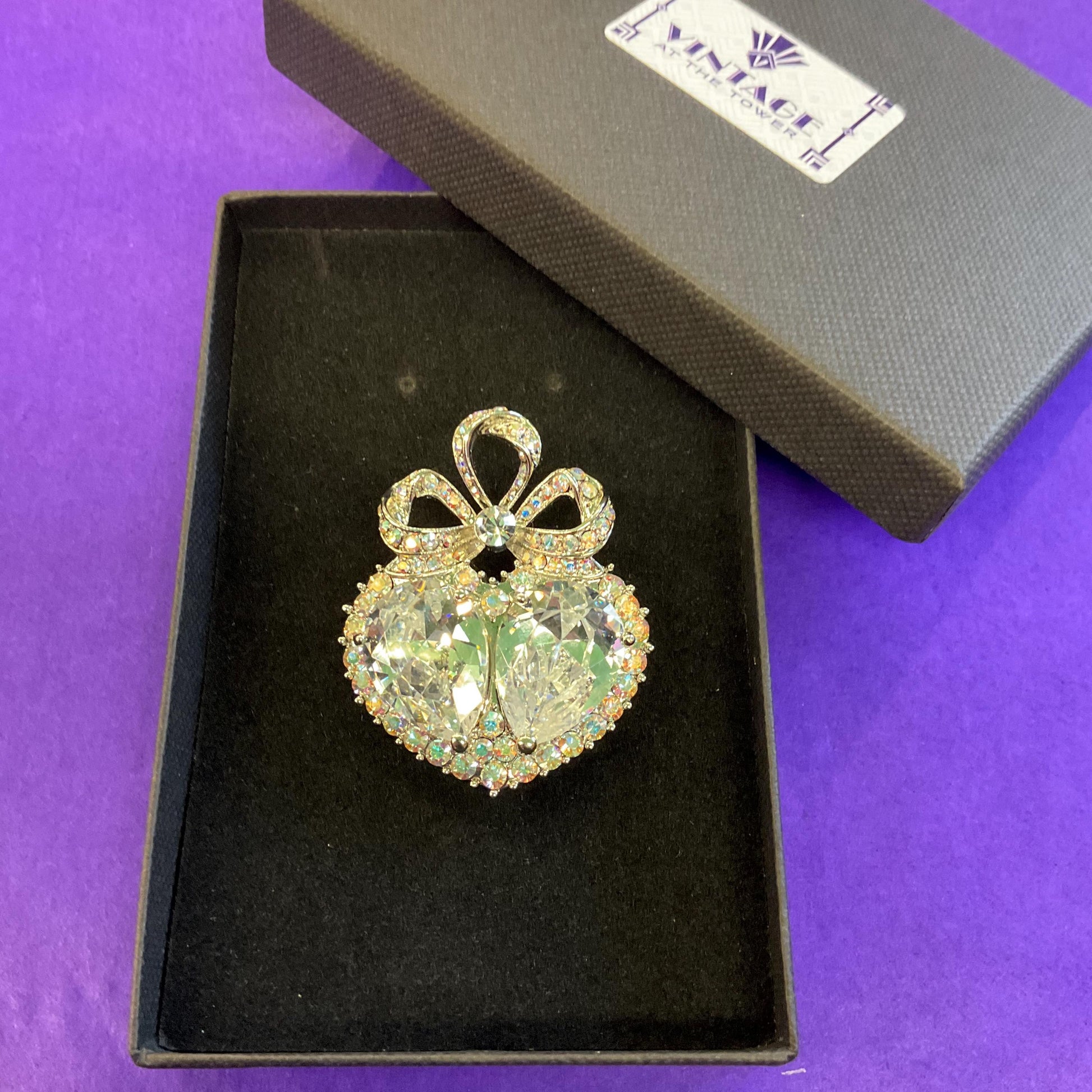 Vintage Butler and Wilson Large Crystal Heart and Bow Brooch , Silver tone with silver crystals and Aurora Borealis Rhinestones