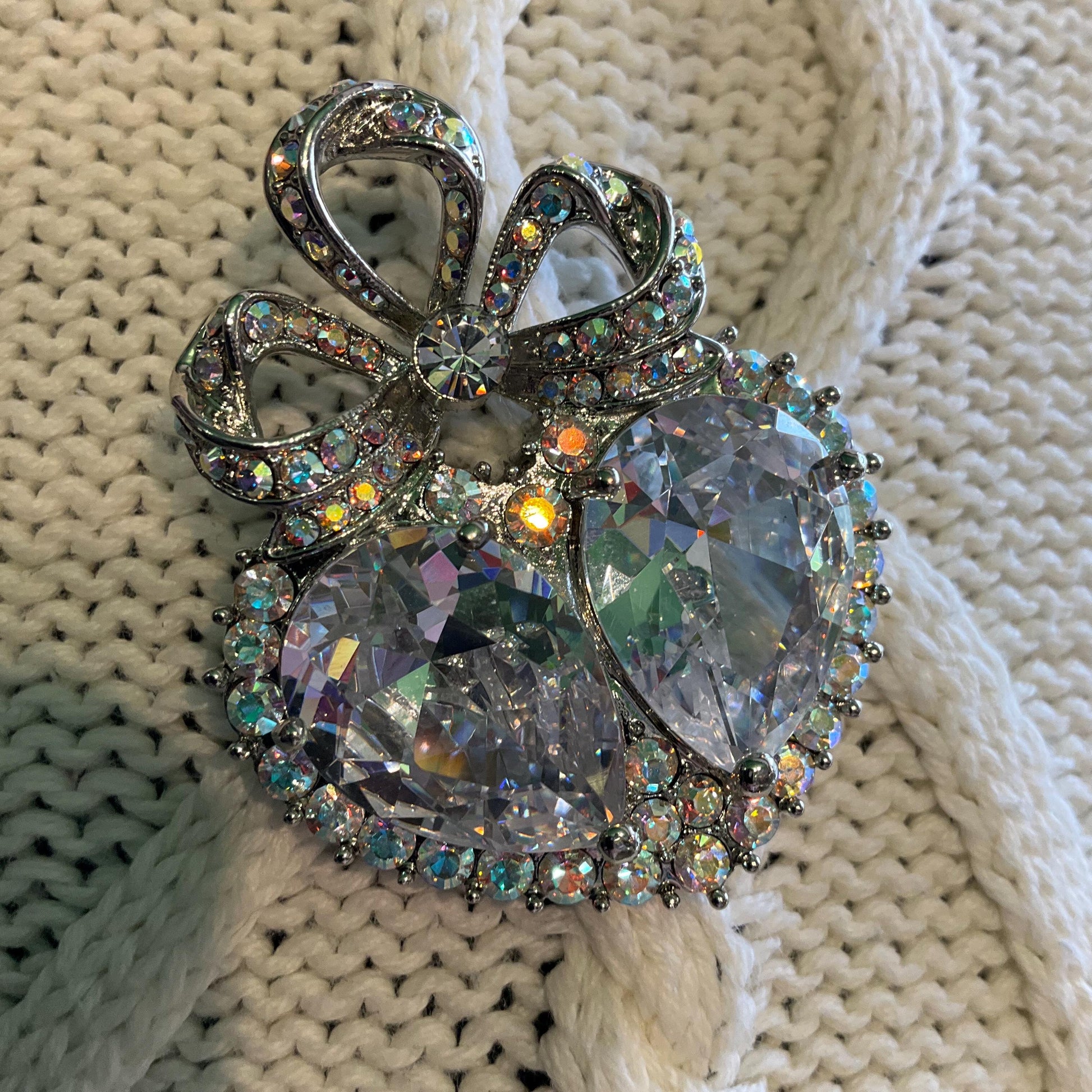 Vintage Butler and Wilson Large Crystal Heart and Bow Brooch , Silver tone with silver crystals and Aurora Borealis Rhinestones