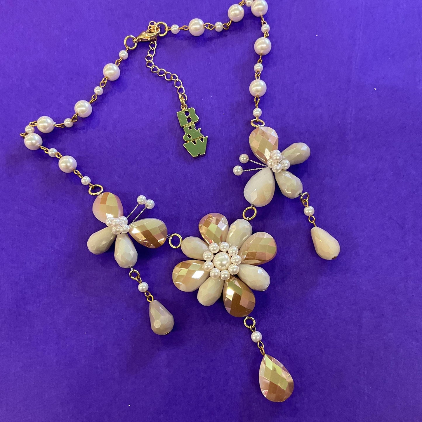 Vintage Butler and Wilson Bohemian Gold and Ivory Crystal and Faux Pearl Flower and Butterflies Drop Necklace, signed as new