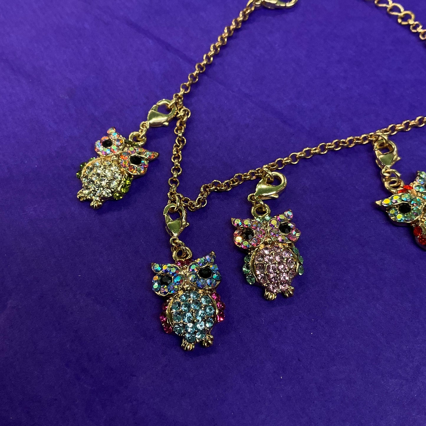 Vintage Butler and Wilson Rainbow Crystal Owl Charm Bracelet, gold tone with multicolored pastel borealis rhinestones