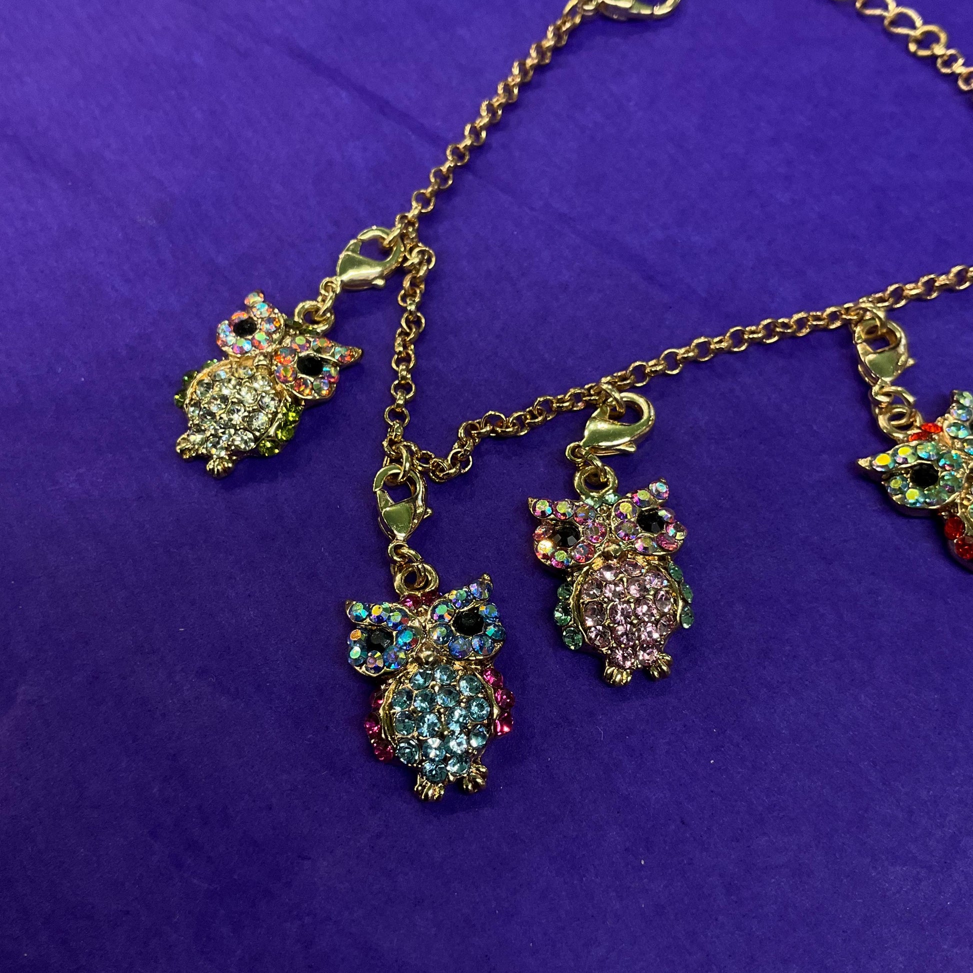Vintage Butler and Wilson Rainbow Crystal Owl Charm Bracelet, gold tone with multicolored pastel borealis rhinestones
