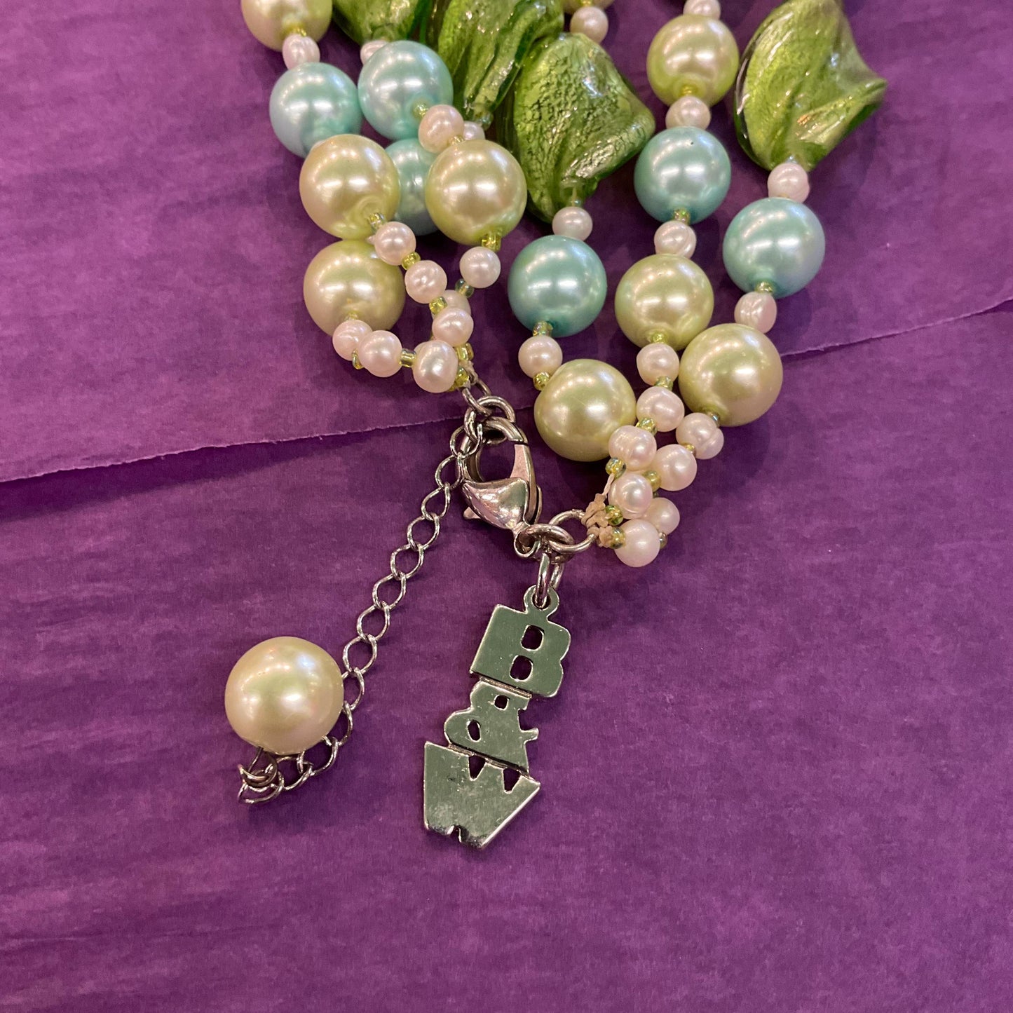 Vintage Butler and Wilson Green Triple Strand Statement Faux Pearl and Foiled Glass Beaded Necklace, as new in original box.