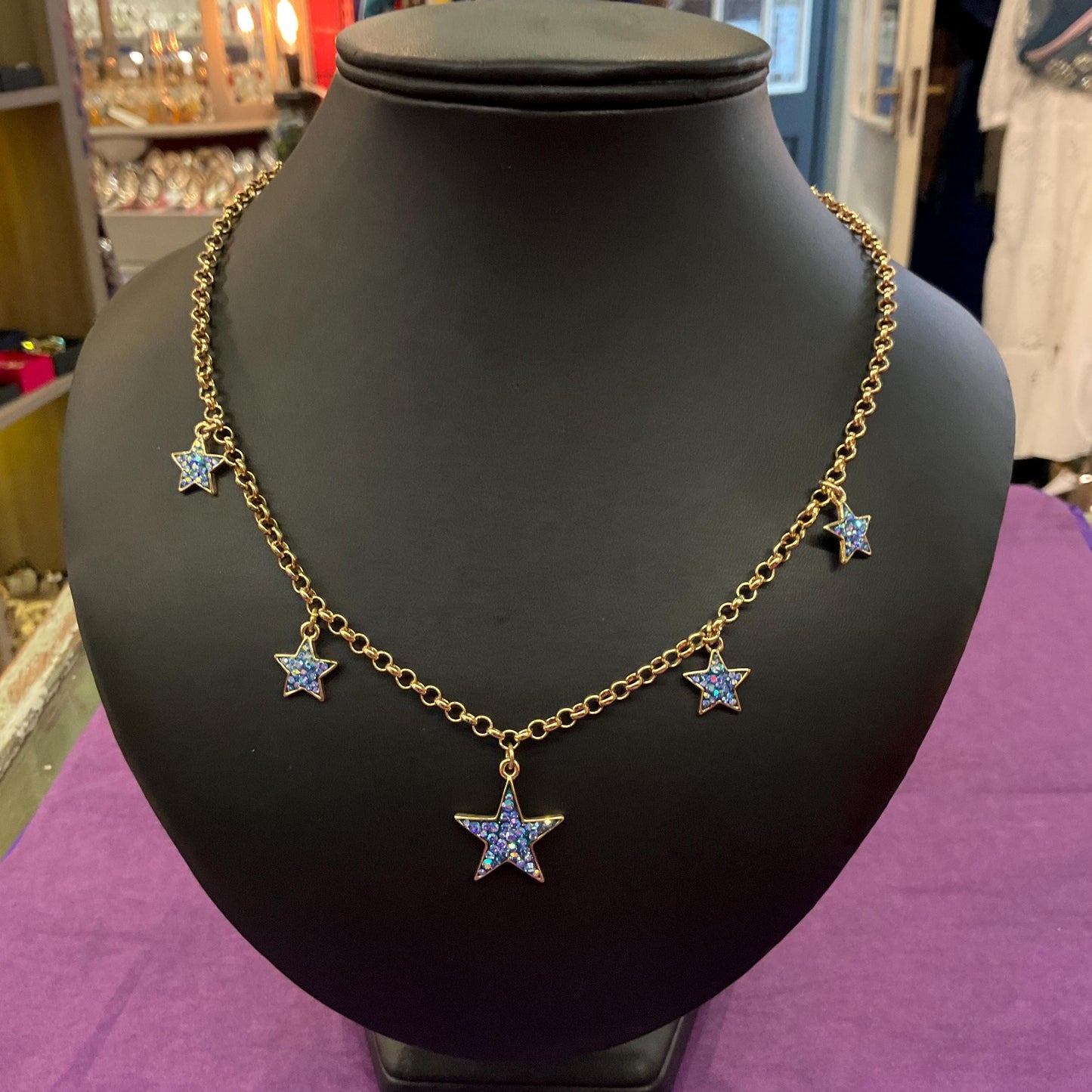 Vintage Butler and Wilson Blue Crystal Star Necklace, gold tone with blue borealis rhinestones
