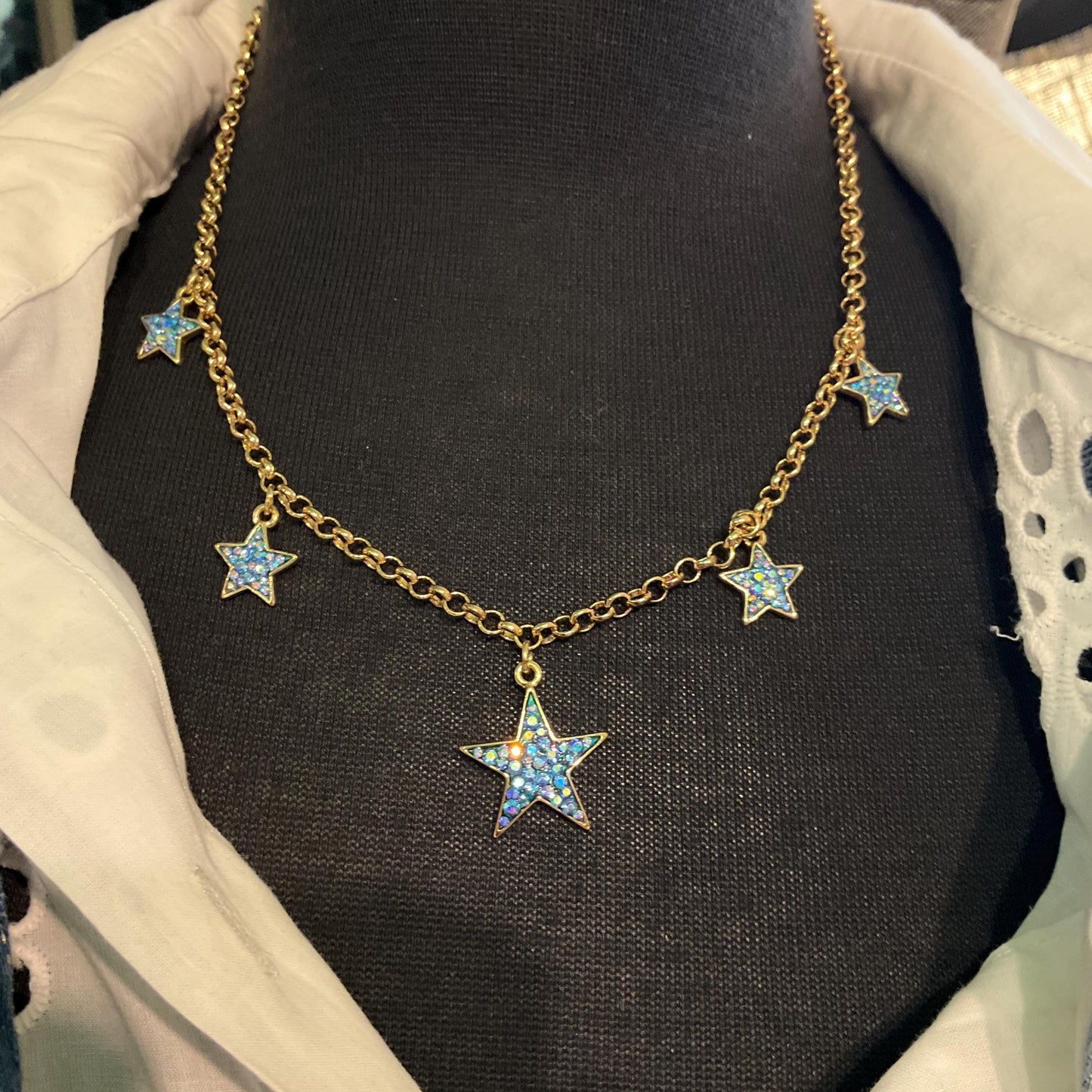 Vintage Butler and Wilson Blue Crystal Star Necklace, gold tone with blue borealis rhinestones