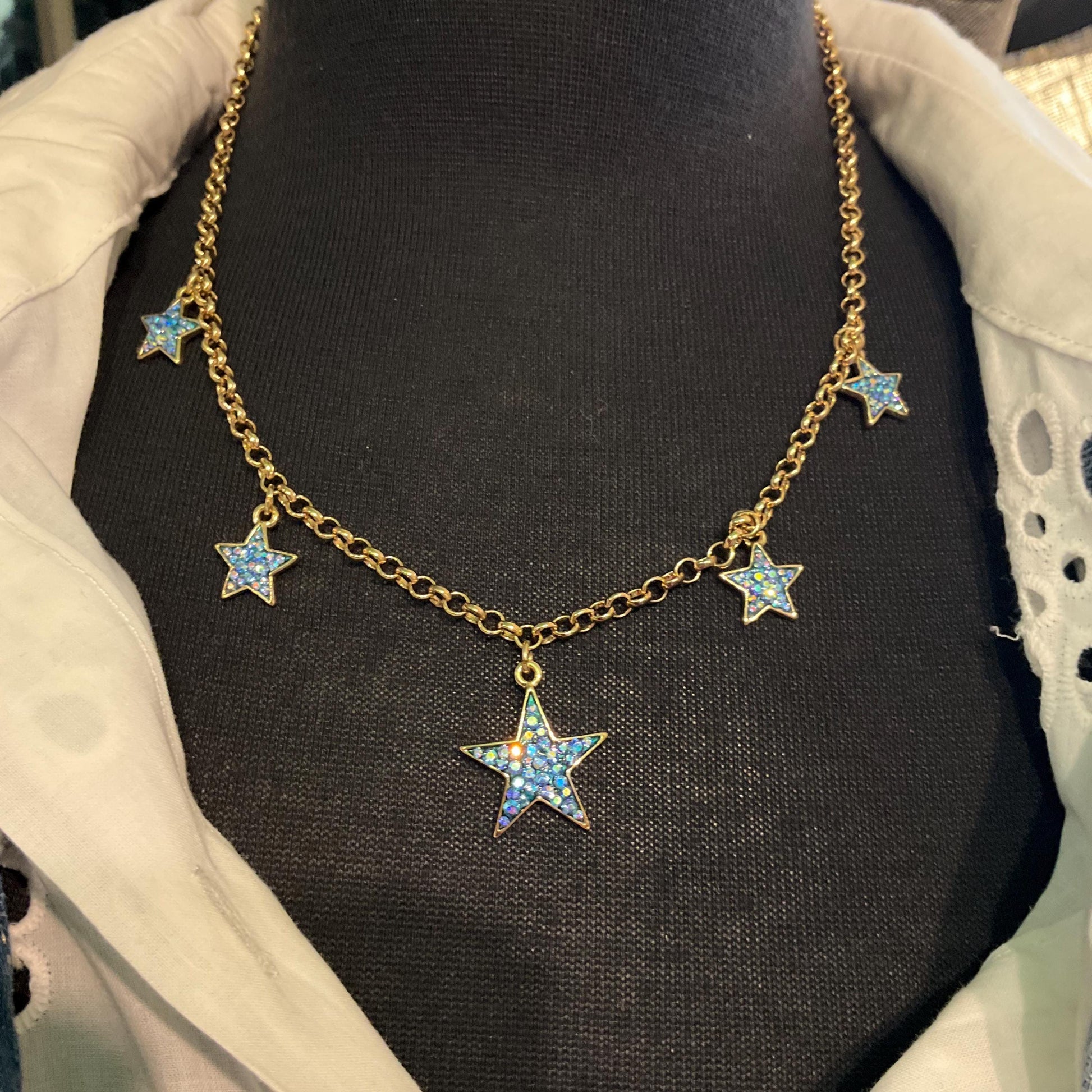 Vintage Butler and Wilson Blue Crystal Star Necklace, gold tone with blue borealis rhinestones