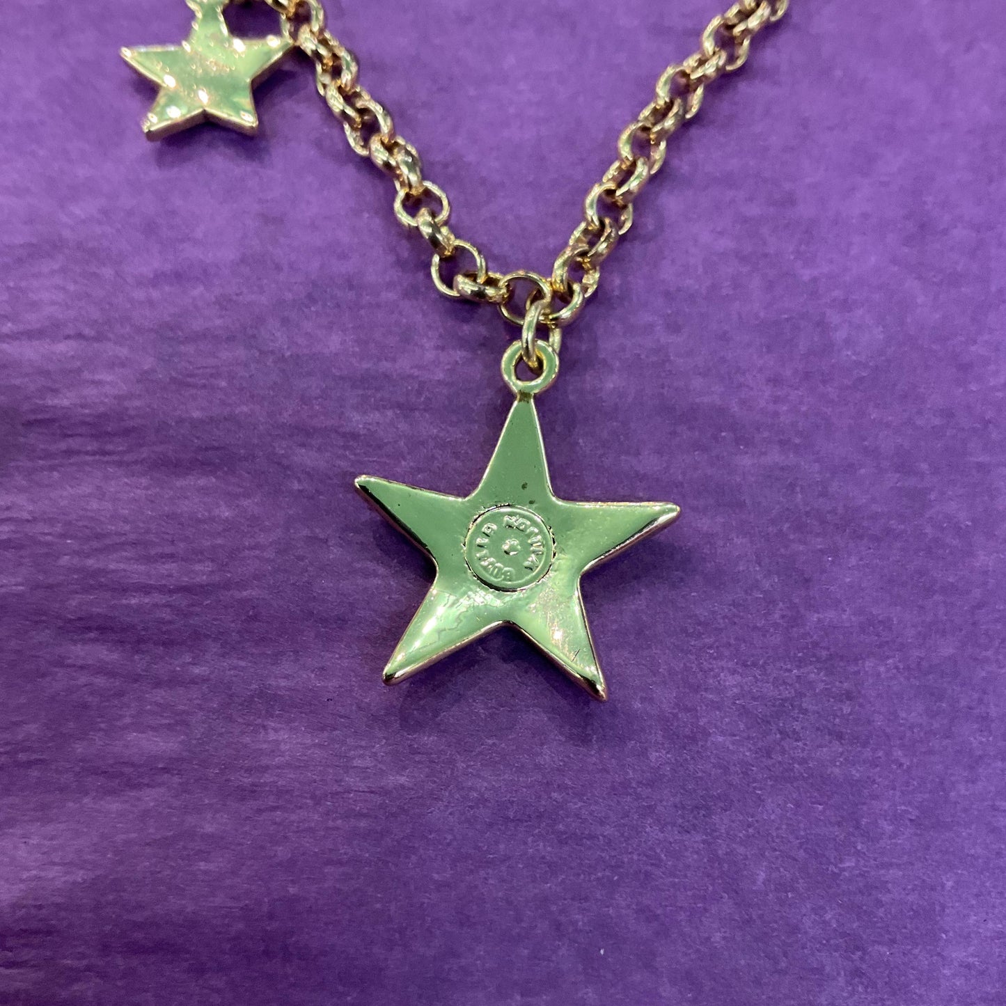 Vintage Butler and Wilson Blue Crystal Star Necklace, gold tone with blue borealis rhinestones