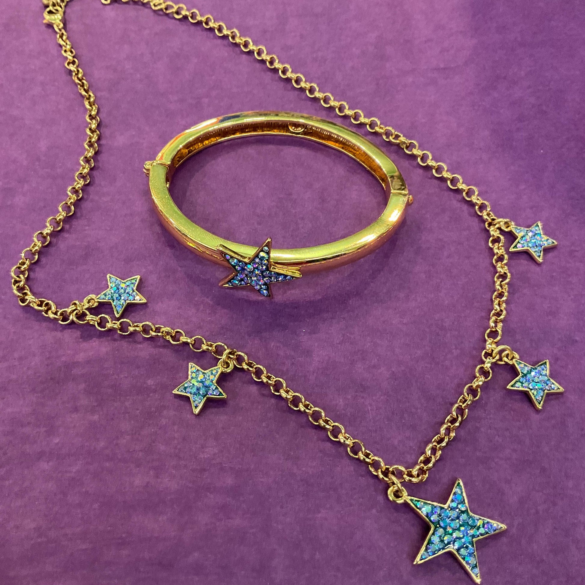 Vintage Butler and Wilson Blue Crystal Star Necklace, gold tone with blue borealis rhinestones