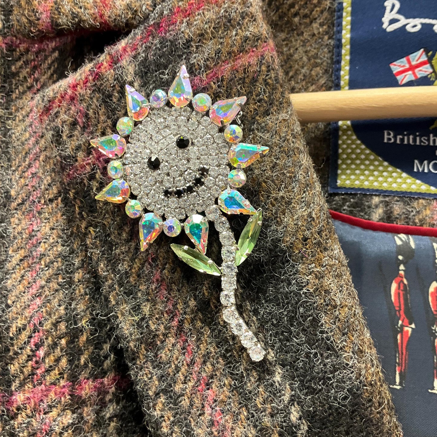 Vintage Butler and Wilson Large Crystal Smiley Sunflower Brooch, Silver tone with silver , Aurora Borealis and Black Rhinestones
